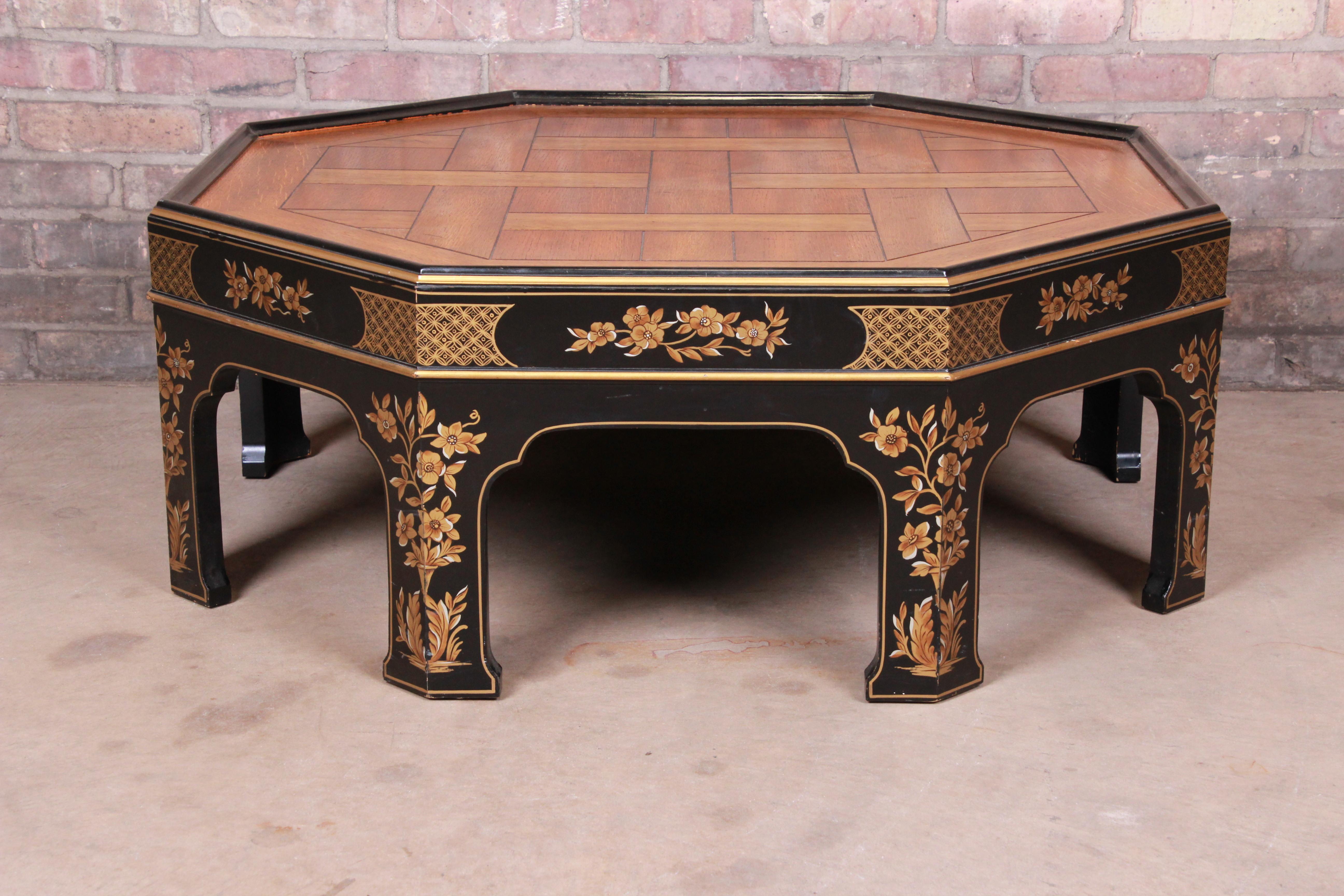 A gorgeous Hollywood Regency chinoiserie coffee or cocktail table

By Baker Furniture

USA, circa 1970s

Oak parquet top, with hand painted Asian designs in floral motif.

Measures: 38.5