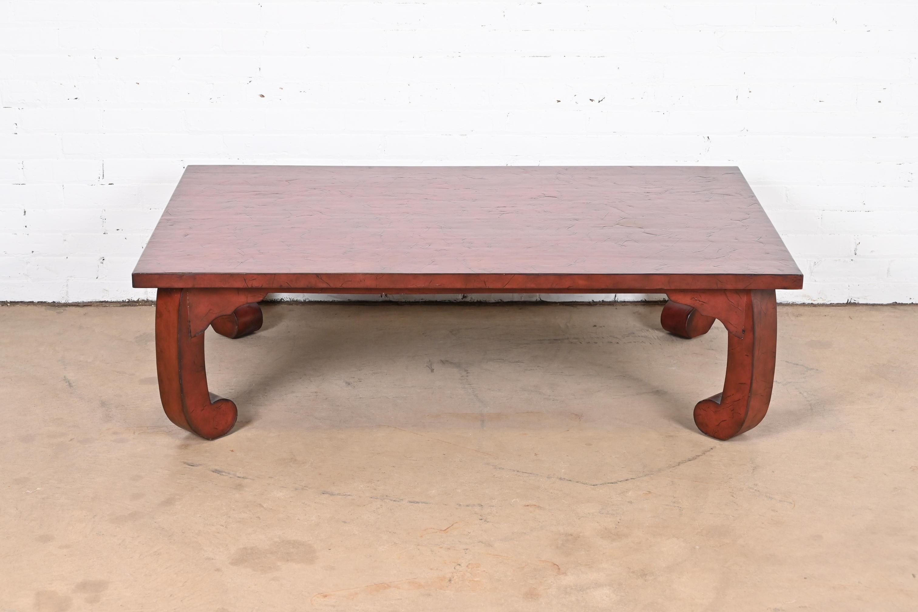 An exceptional Hollywood Regency Chinoiserie style red lacquered 