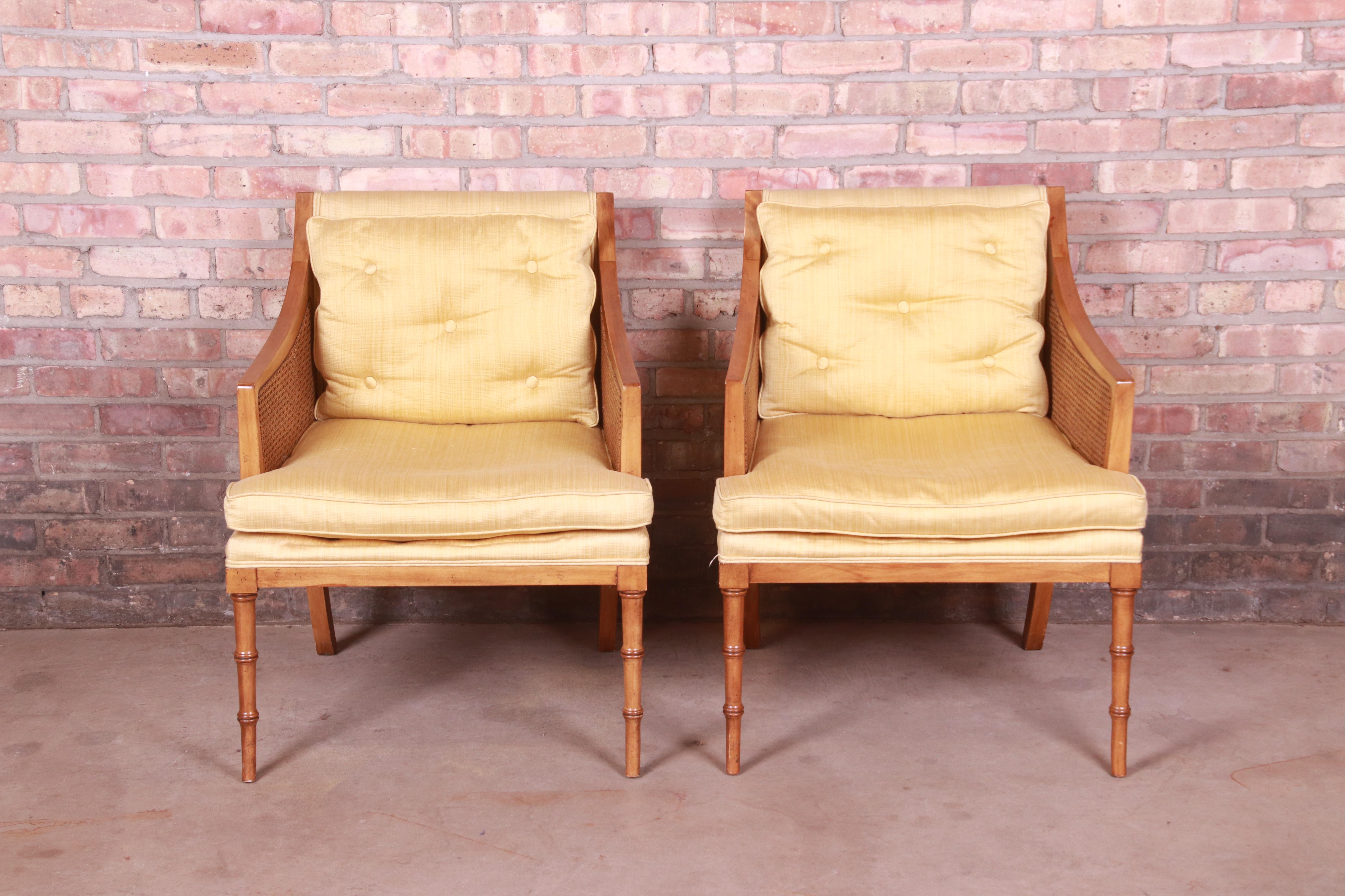 A gorgeous pair of Mid-Century Modern Hollywood Regency club chairs or lounge chairs

By Baker Furniture, 
