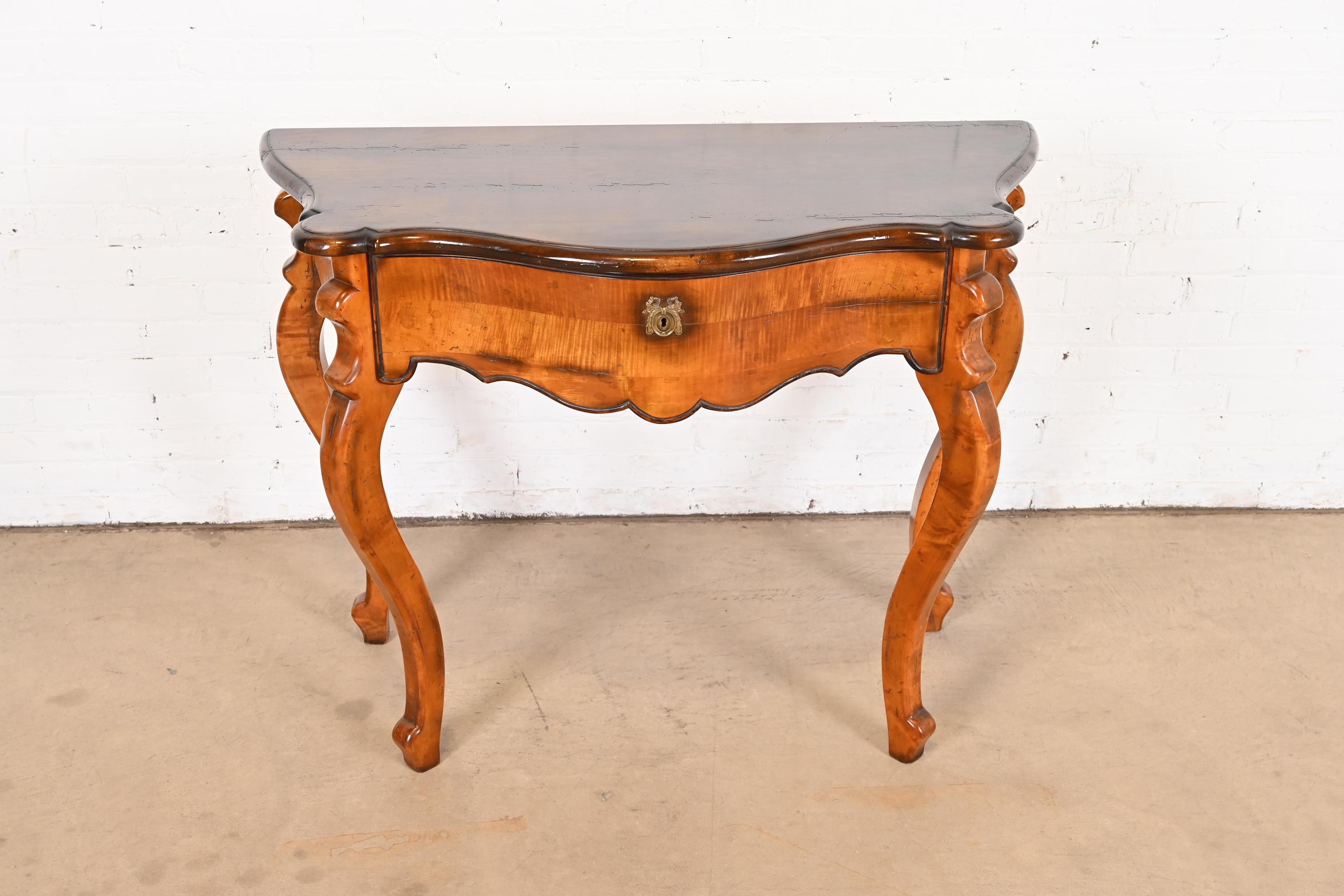 A beautiful Italian Provincial Louis XV style console table or entry table

By Baker Furniture, 