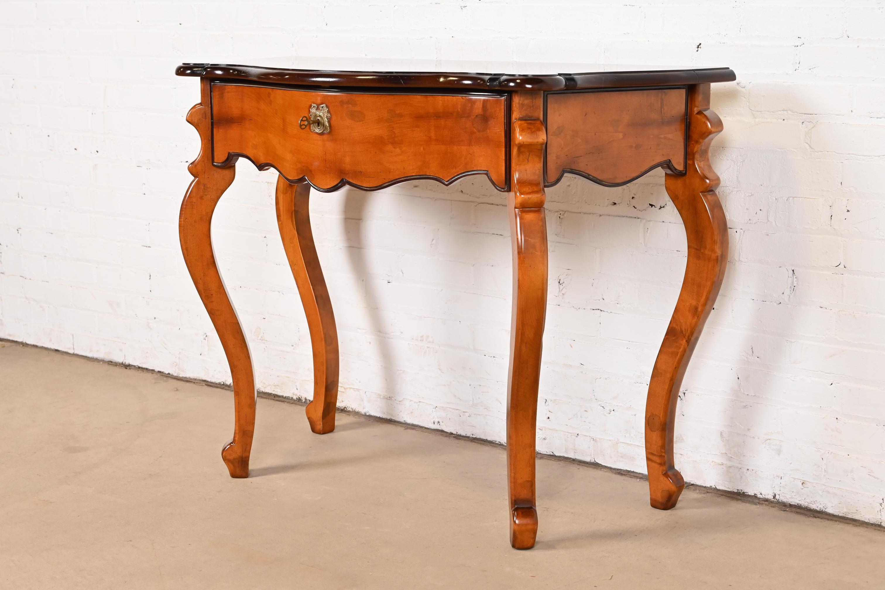 A beautiful Italian Provincial Louis XV style console or entry table

By Baker Furniture, 
