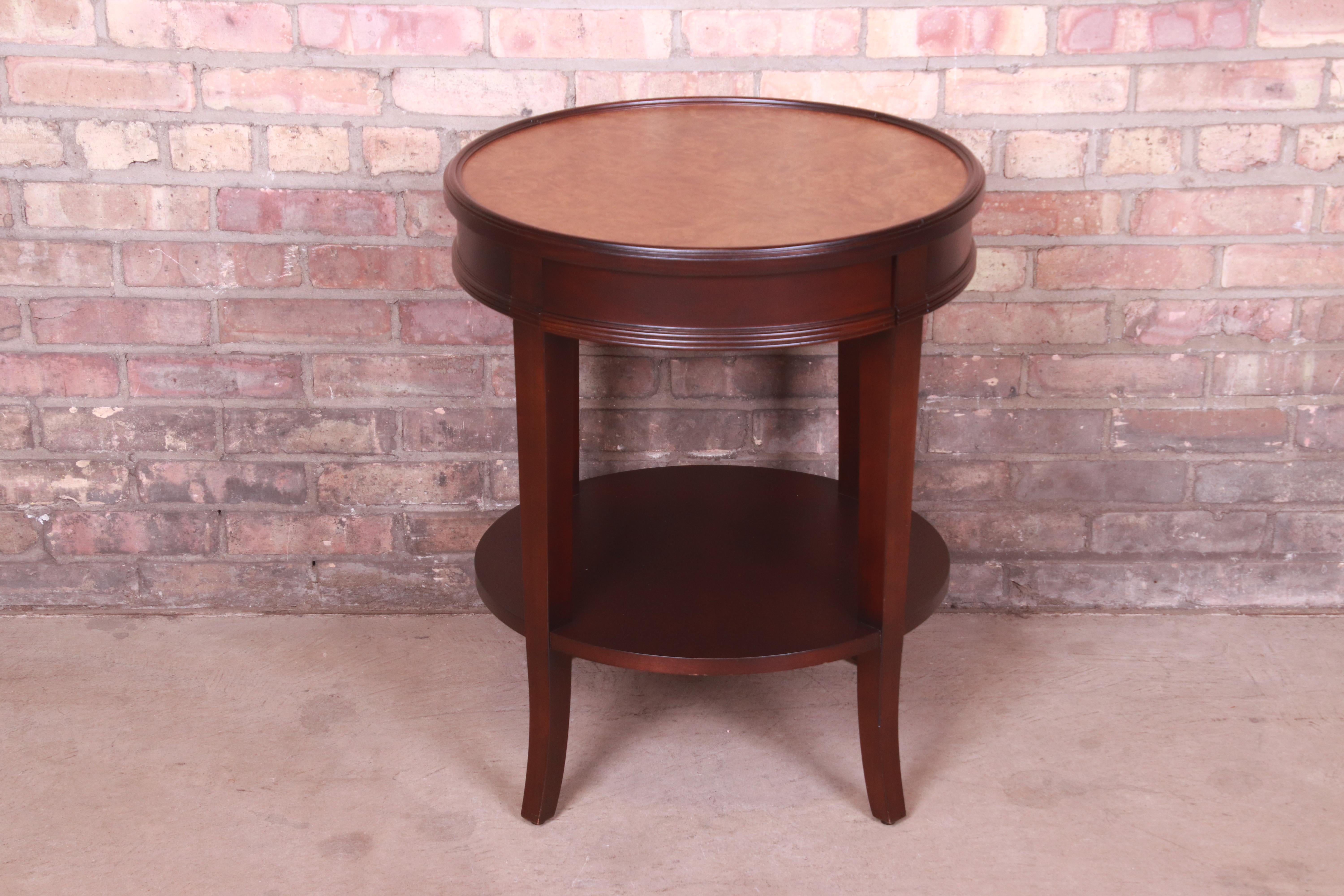 A gorgeous Italian Provincial two-tier tea table or occasional side table

By Baker Furniture, 