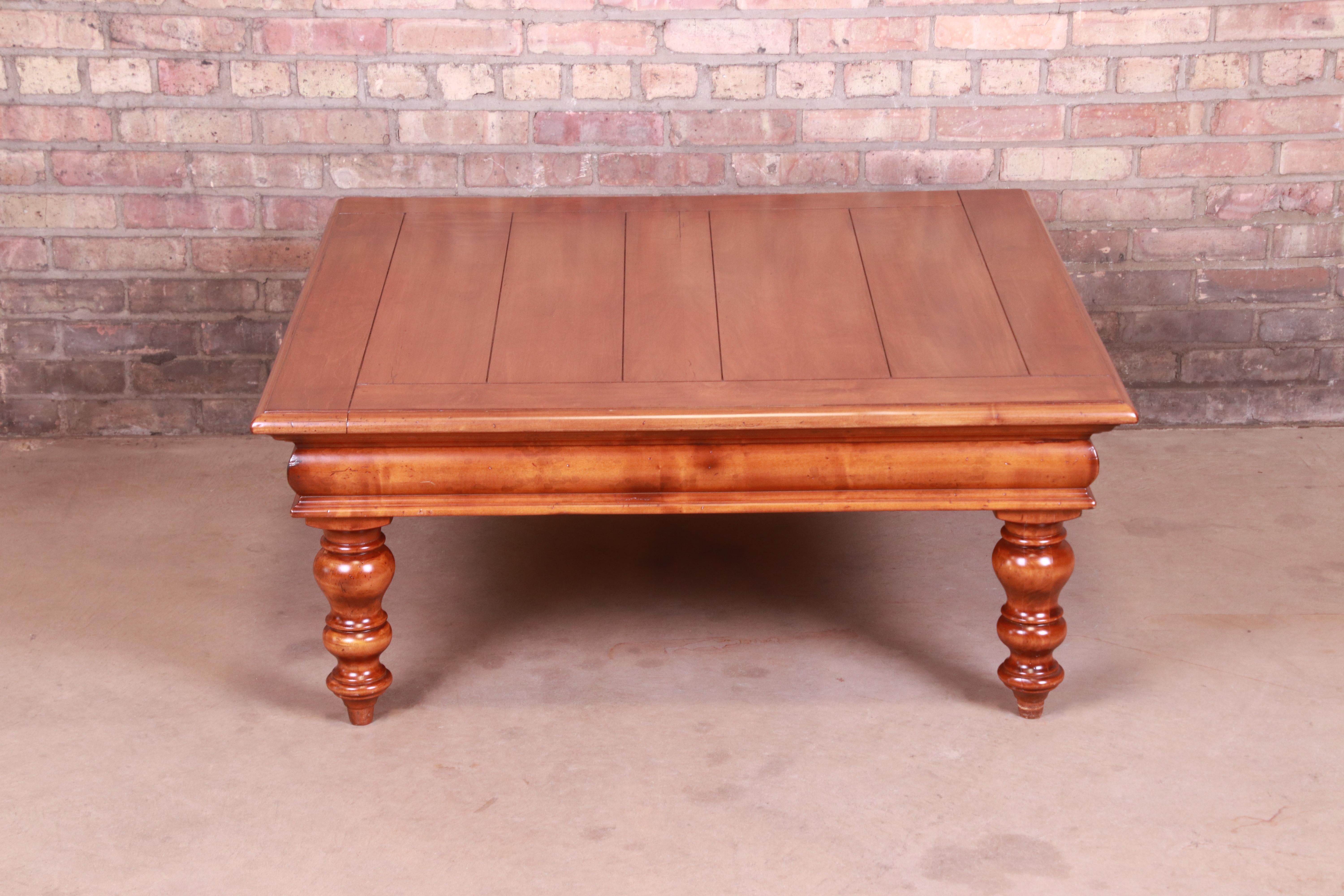 A gorgeous Italian Provincial style maple coffee table with turned legs

By Baker Furniture 