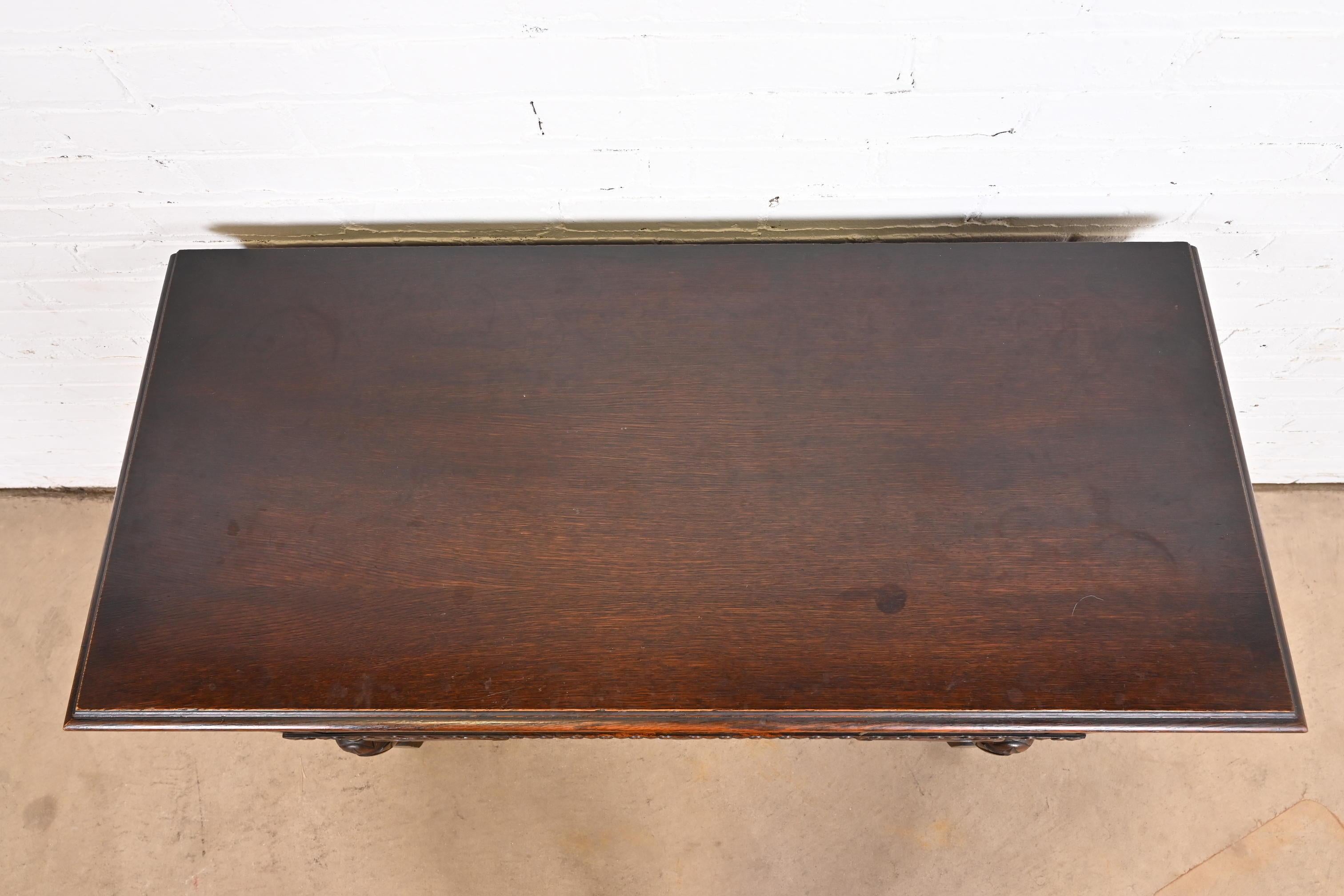 Baker Furniture Jacobean Carved Oak Sideboard Buffet or Bar Cabinet, Circa 1920s 5