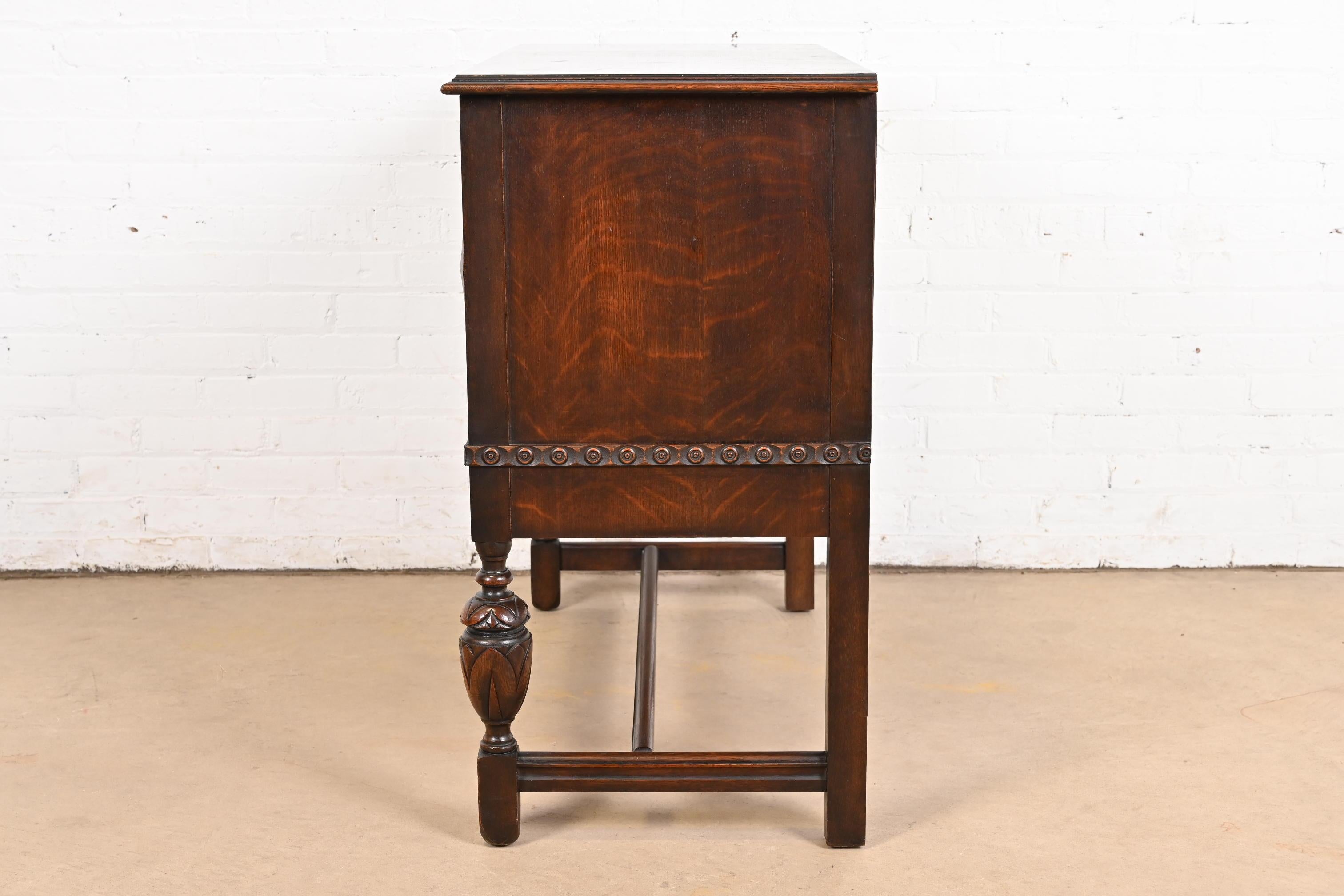 Baker Furniture Jacobean Carved Oak Sideboard Buffet or Bar Cabinet, Circa 1920s 6