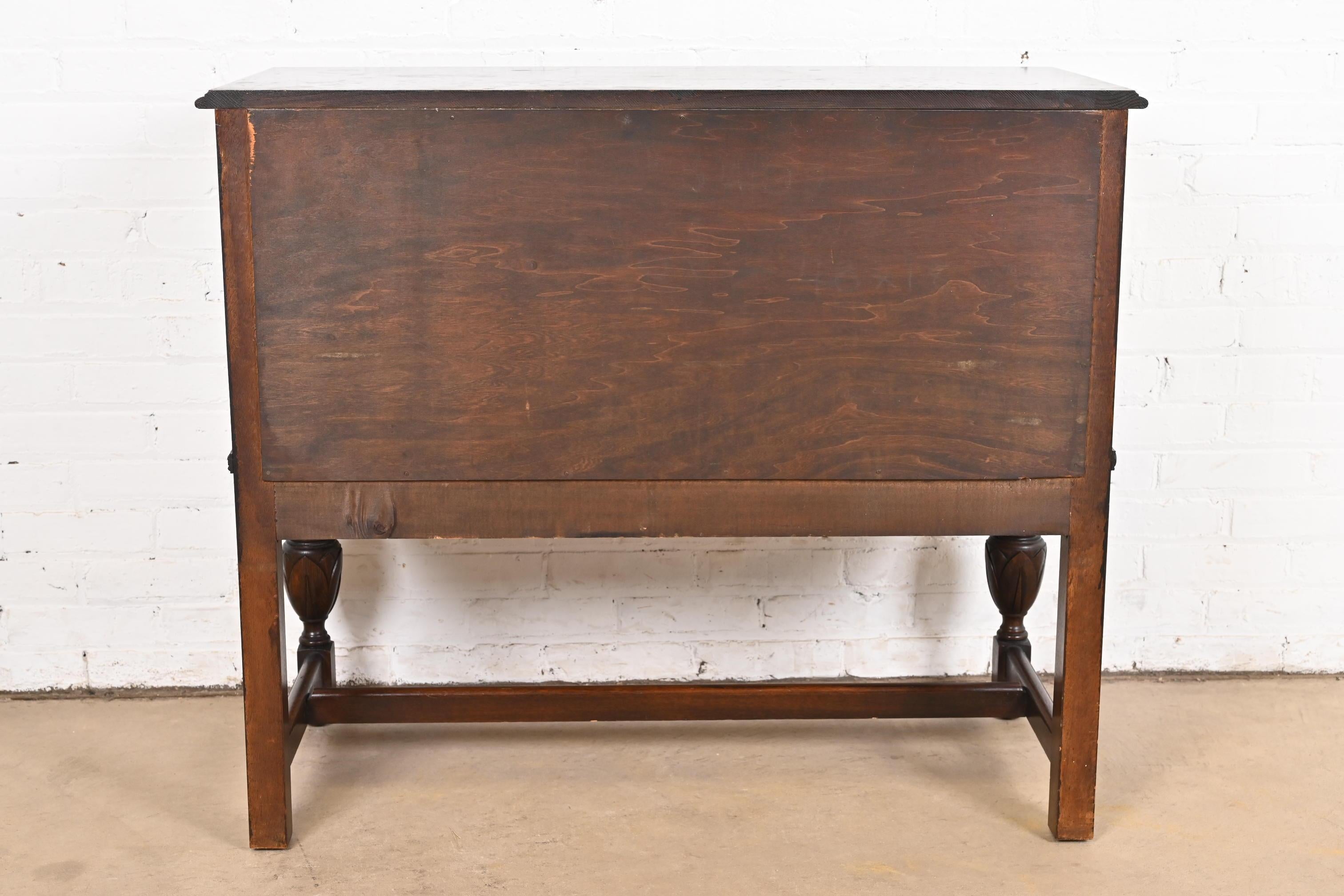 Baker Furniture Jacobean Carved Oak Sideboard Buffet or Bar Cabinet, Circa 1920s 7