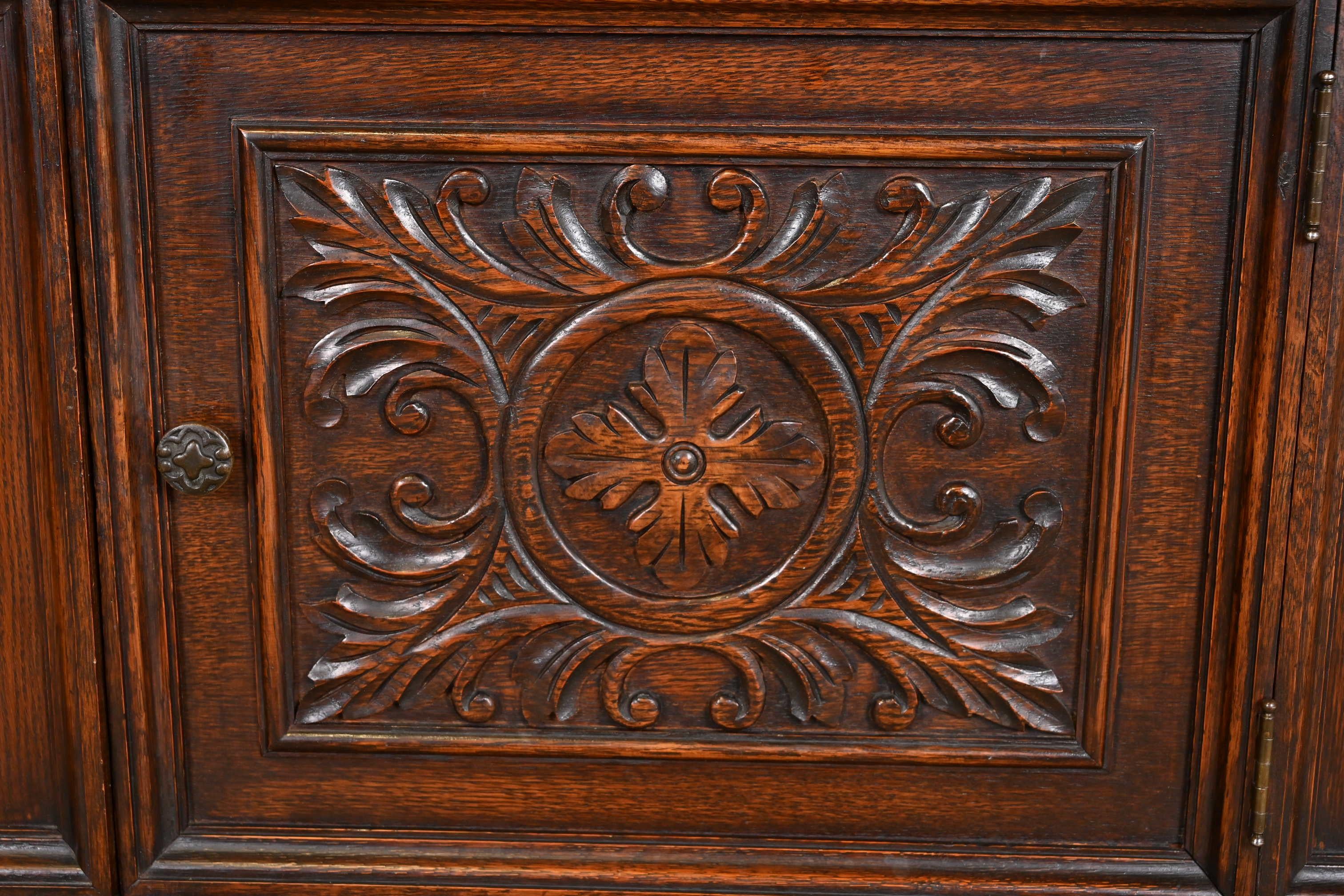 Baker Furniture Jacobean Carved Oak Sideboard Buffet or Bar Cabinet, Circa 1920s 3
