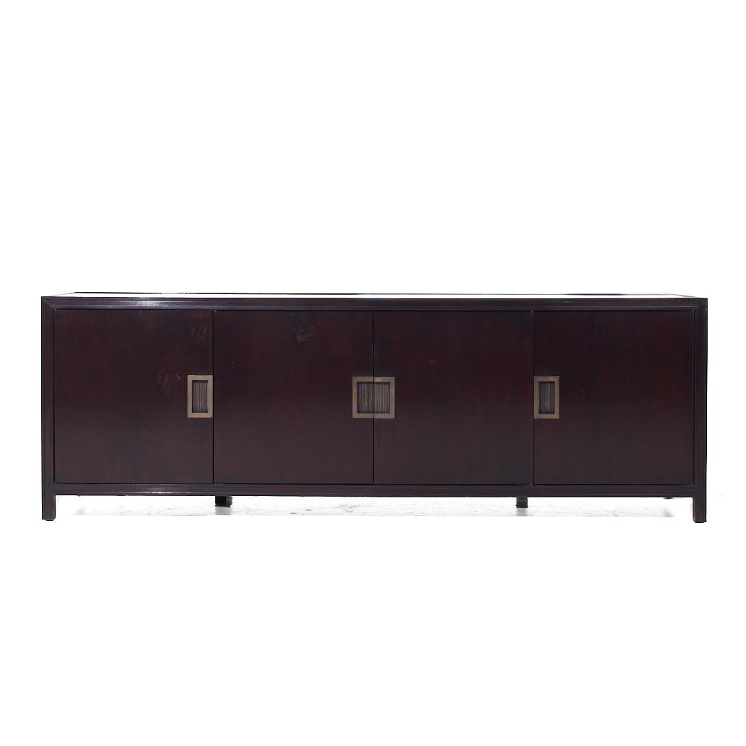 Baker Furniture Mahogany and Bronze Credenza

This credenza measures: 80 wide x 20 deep x 27 inches high

We take our photos in a controlled lighting studio to show as much detail as possible. We do not Photoshop out blemishes.

CONDITION: This item