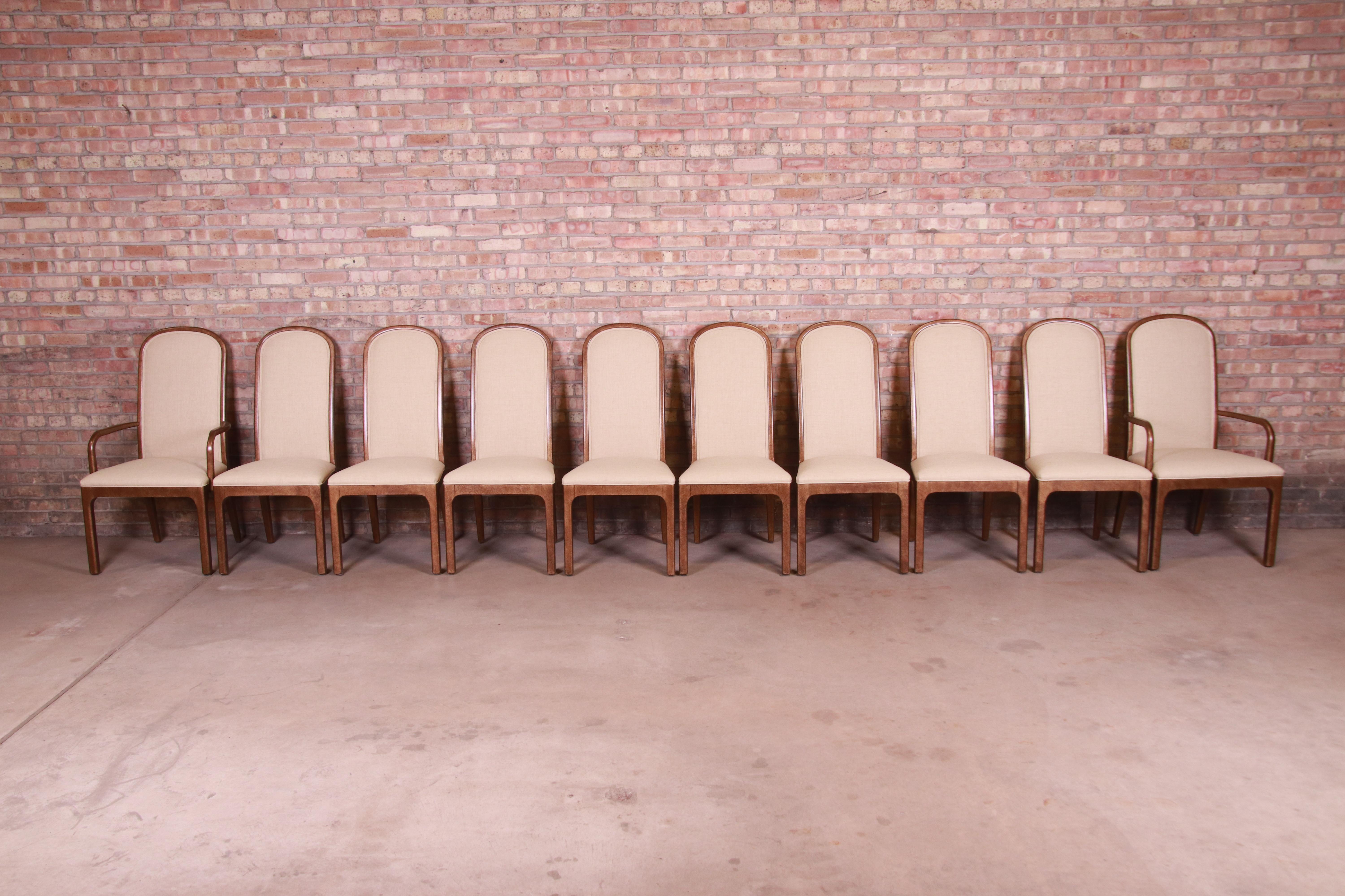 A gorgeous set of ten Mid-Century Modern arched back dining chairs

By Baker Furniture

USA, circa 1960s

Carved wood frames in a bronzed metallic finish, with upholstered seats and backs.

Measures:
Armchairs 21.75