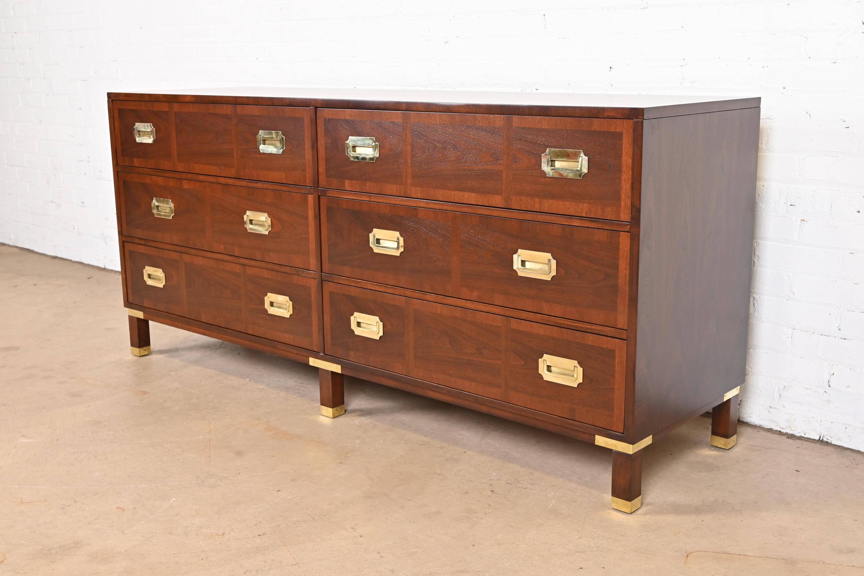An exceptional mid-century modern Hollywood Regency Campaign style six-drawer dresser or credenza

By Baker Furniture, 