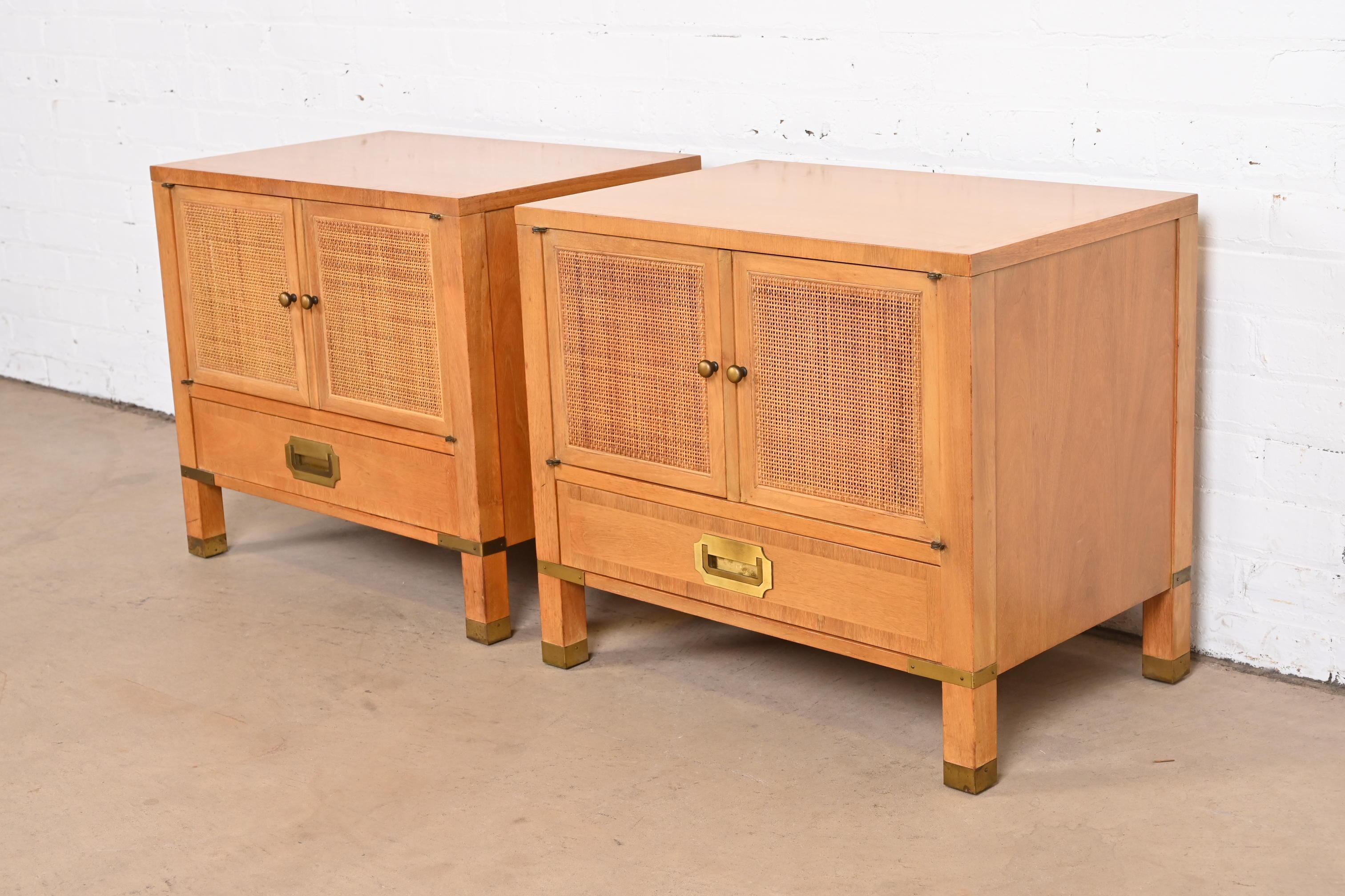 American Baker Furniture Midcentury Campaign Walnut, Cane, and Brass Nightstands, 1960s For Sale