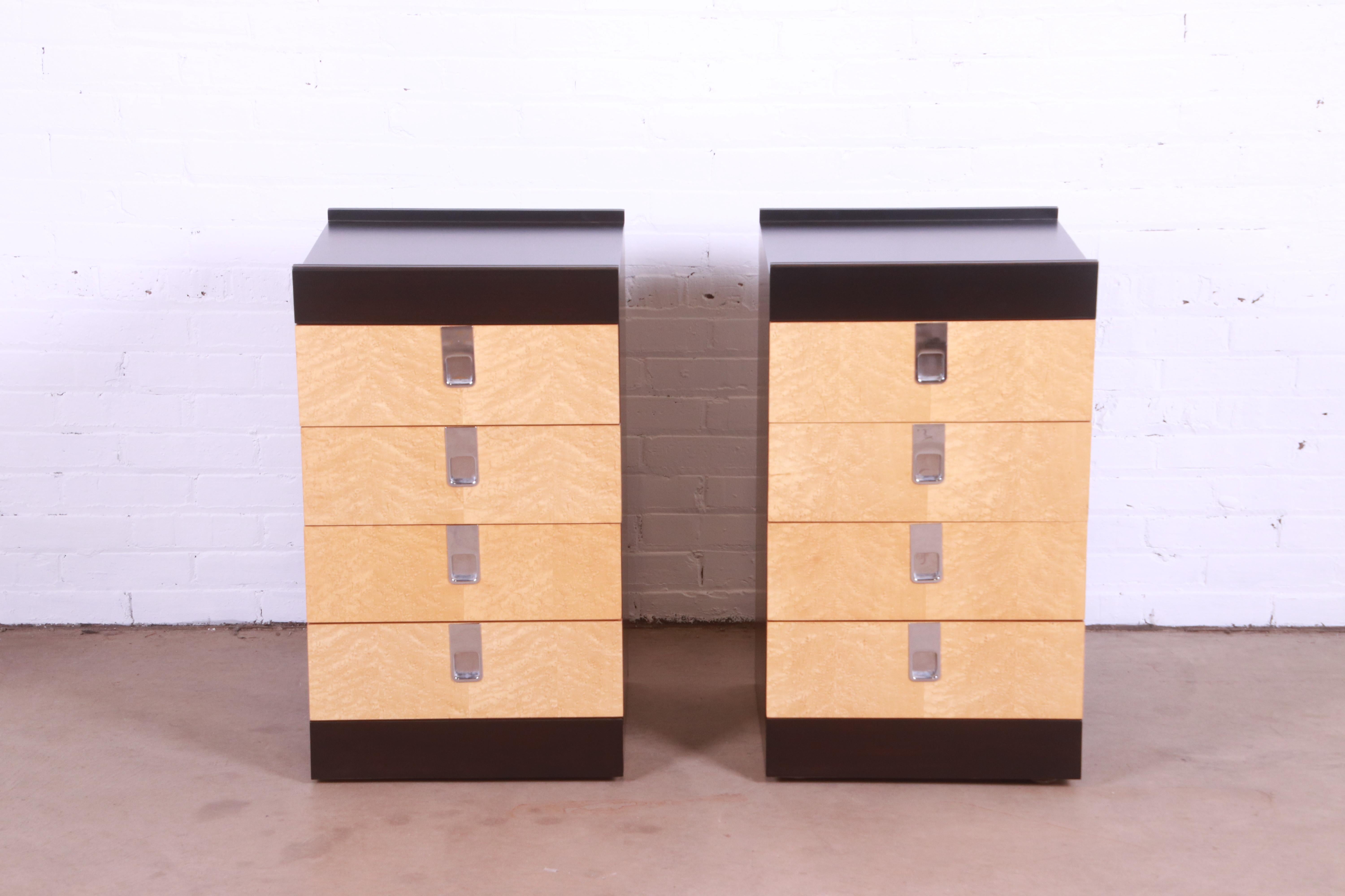 A gorgeous pair of Mid-Century Modern four-drawer chests or nightstands

By Brian Palmer for Baker Furniture

USA, 1970s

Birdseye maple drawer fronts, with ebonized cases and original chrome hardware.

Measures: 18