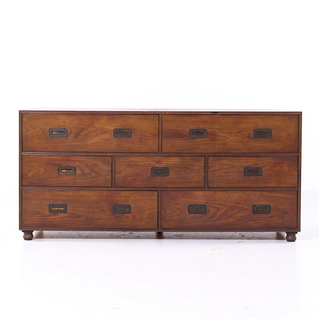 Baker Furniture Mid Century Walnut Campaign Lowboy Dresser

This lowboy measures: 66 wide x 19 deep x 30.75 inches high

All pieces of furniture can be had in what we call restored vintage condition. That means the piece is restored upon purchase so