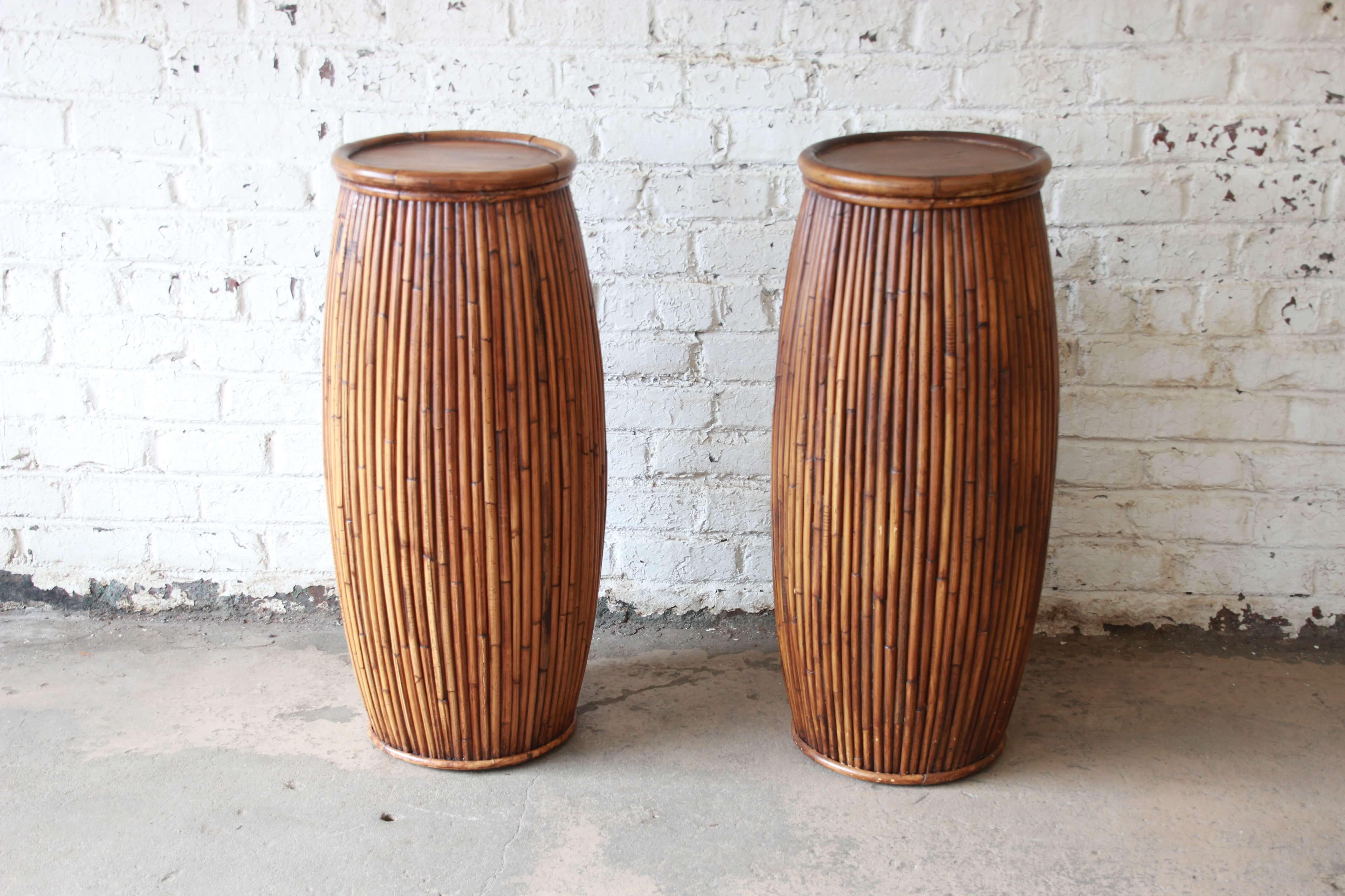 Offering a nice and rare pair of Baker Furniture bamboo plant stands. These stands have a nice finish and are very sturdy to hold many different arrange of plants, lamps, or accessories. They were manufactured for the Milling Road division of Baker