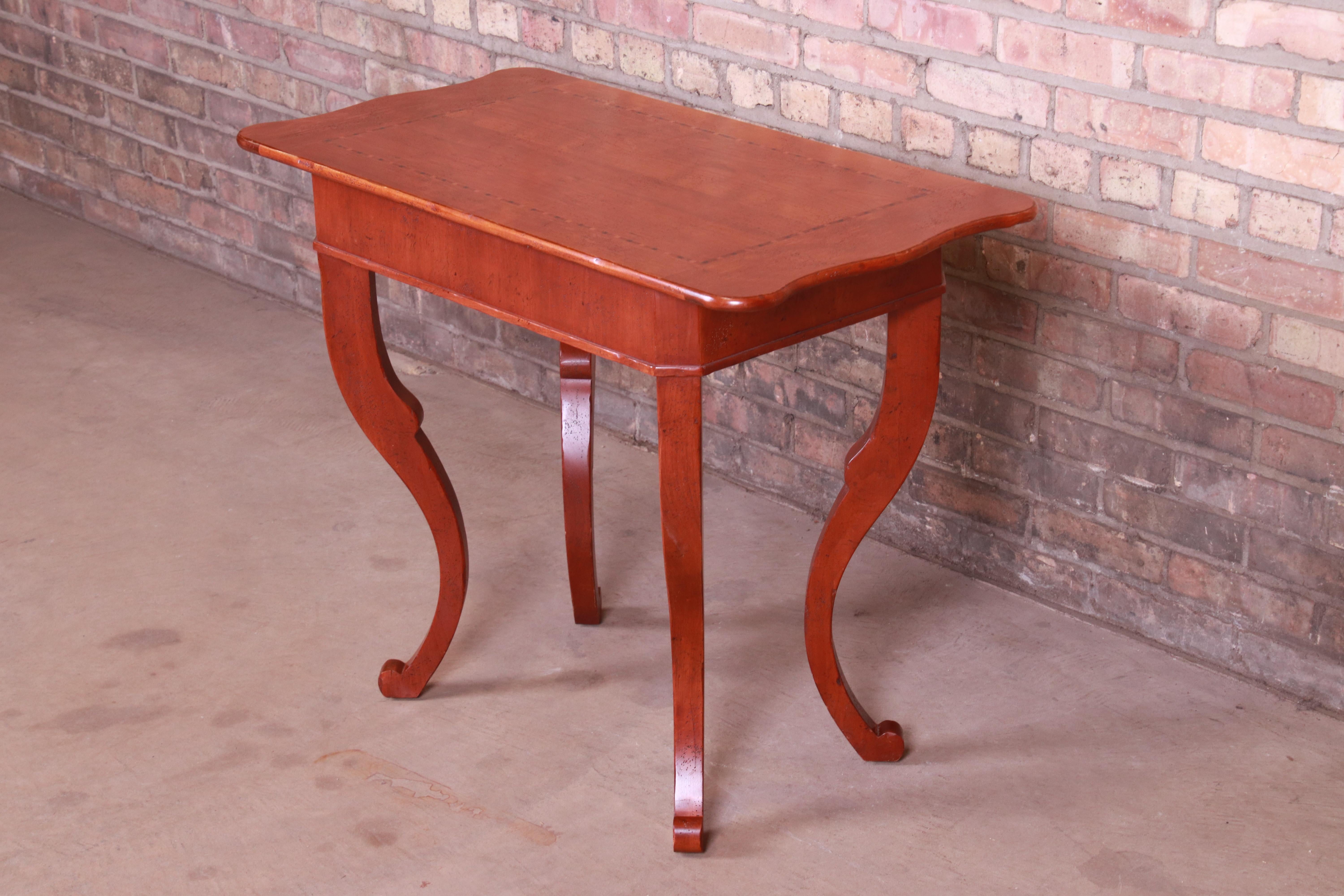 A gorgeous French Provincial Louis XV style tea table or side table

By Baker Furniture 