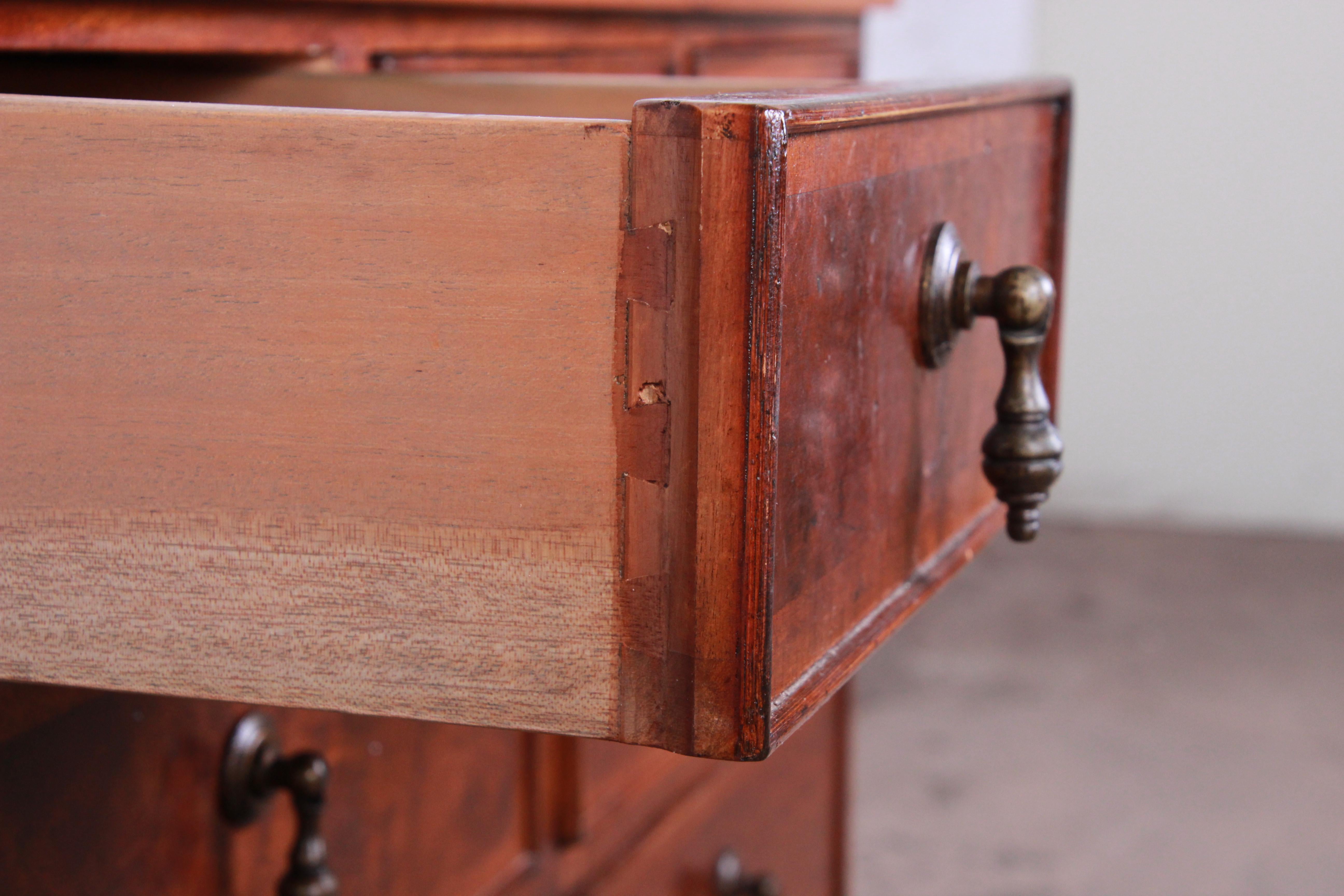 Late 20th Century Baker Furniture Milling Road Georgian Burled Walnut Seven-Drawer Dresser Chest