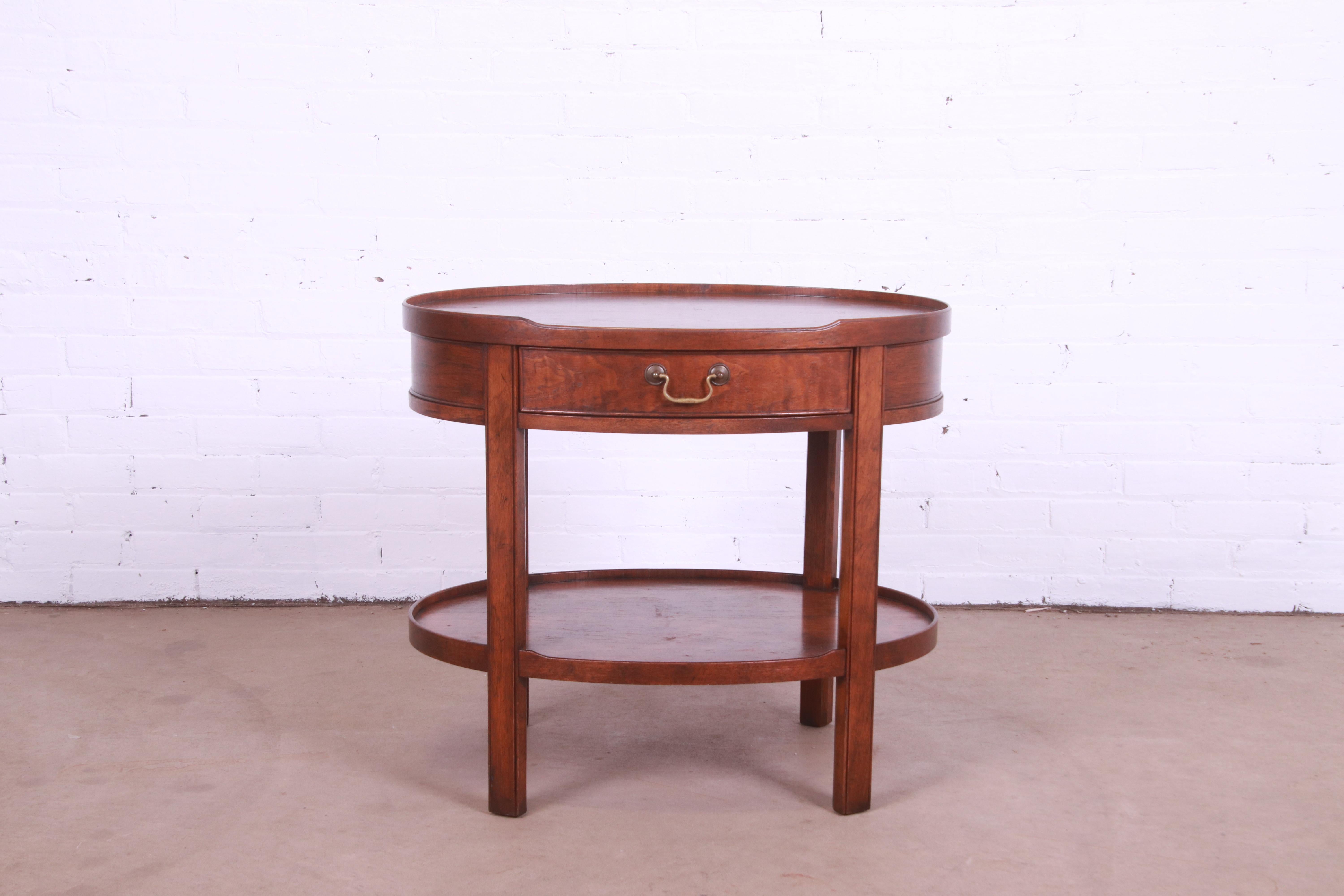 American Baker Furniture Milling Road Georgian Walnut Tea Table, circa 1960s