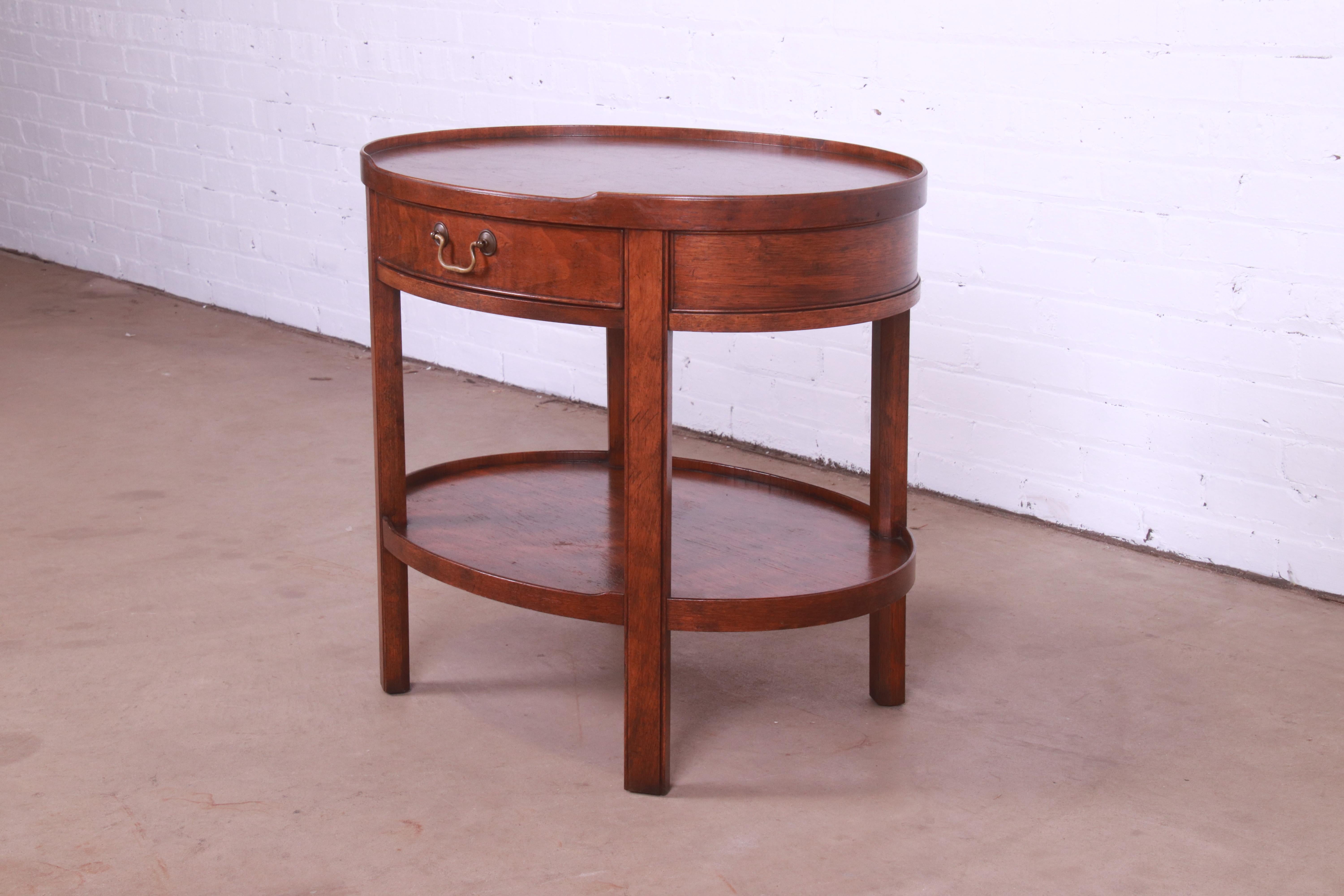 20th Century Baker Furniture Milling Road Georgian Walnut Tea Table, circa 1960s