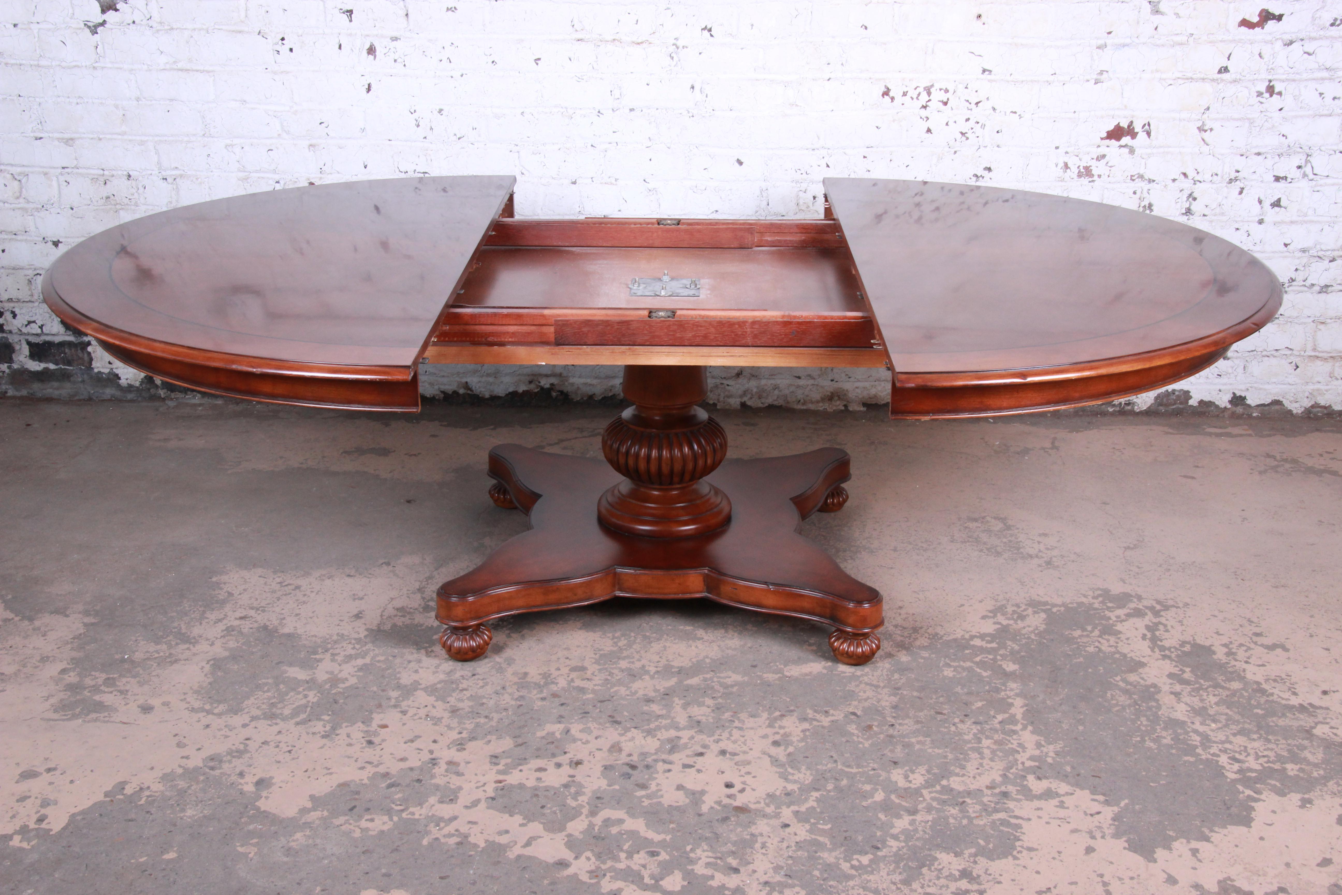 Late 20th Century Baker Furniture Milling Road Neoclassical Banded Mahogany Pedestal Dining Table