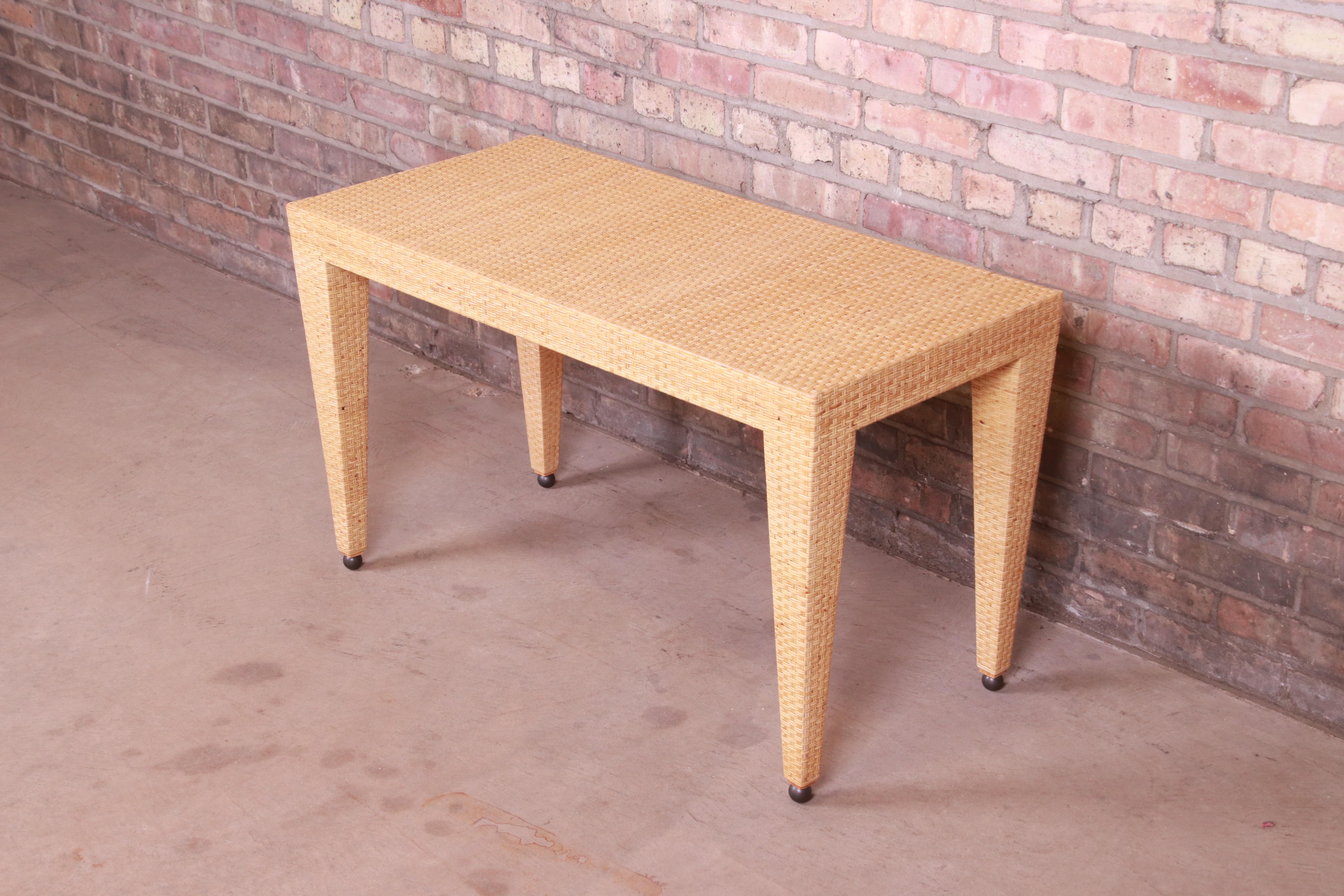 A gorgeous organic modern woven rattan coffee or cocktail table

By Baker Furniture 