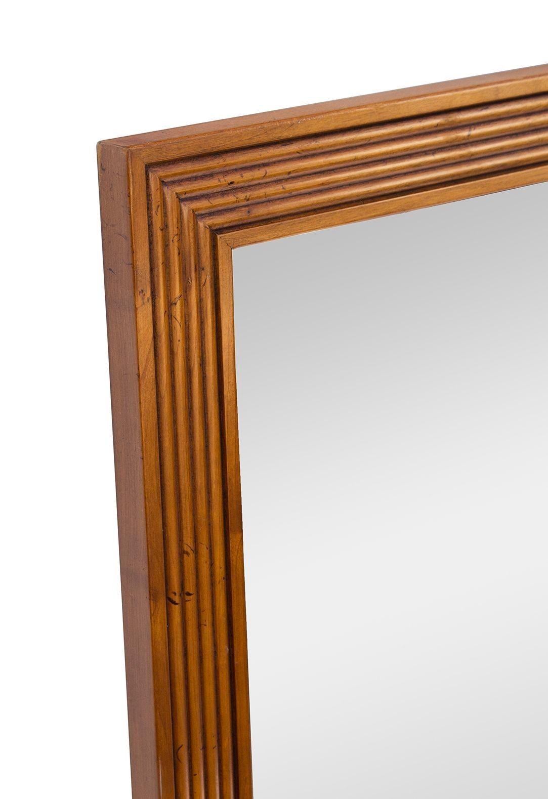 USA, 1970s
Baker Furniture / Milling Road stepped or beveled mirror in a large size- 34 x 44. This piece is both substantial and well made. It offers a nice combination of quality, simplicity, and visual interest. The quality is vintage but the