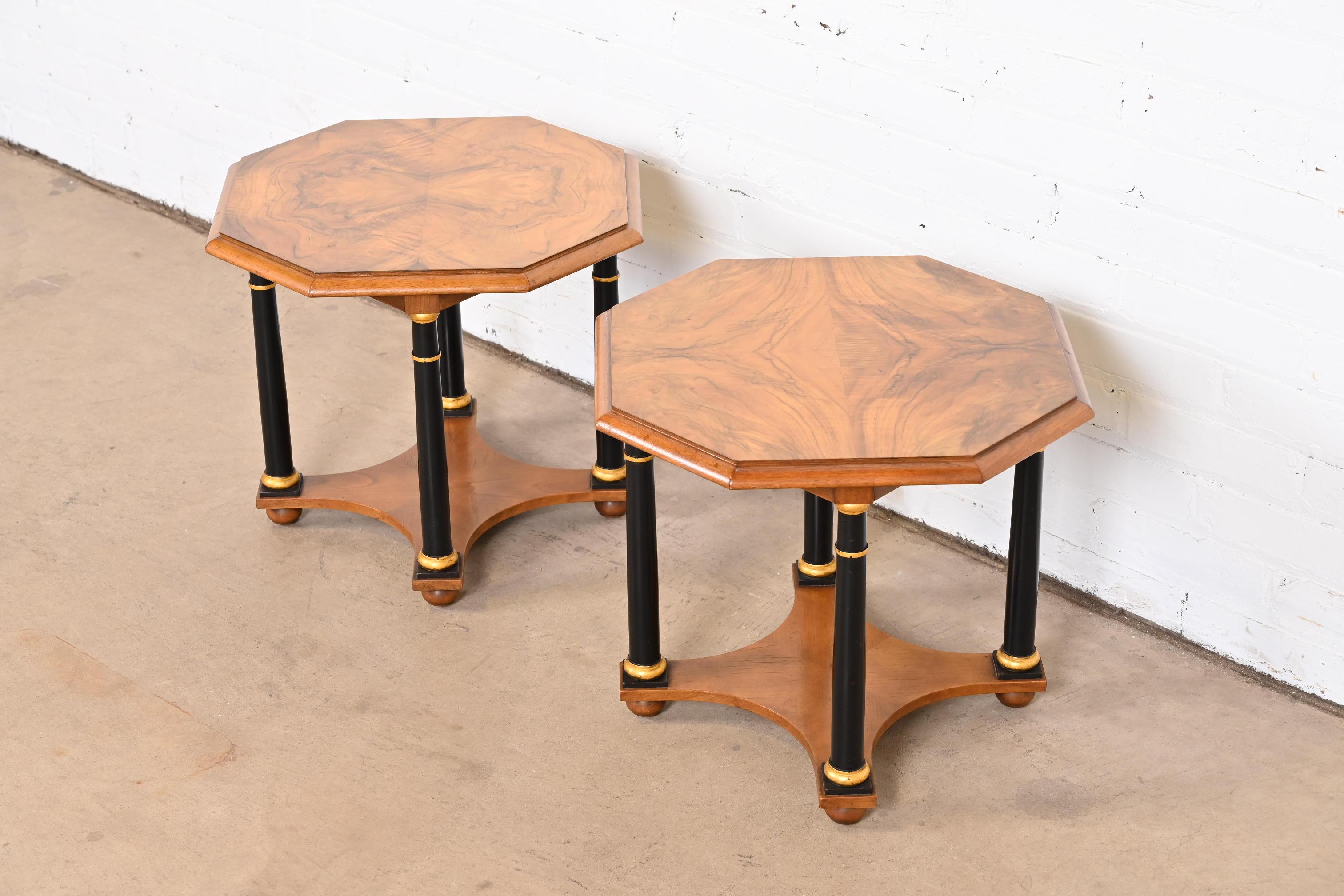 A gorgeous pair of Neoclassical or Empire style nightstands or end tables

By Baker Furniture

USA, Mid-20th Century

Stunning burled walnut, with ebonized columns and painted gilt details.

Measures: 18