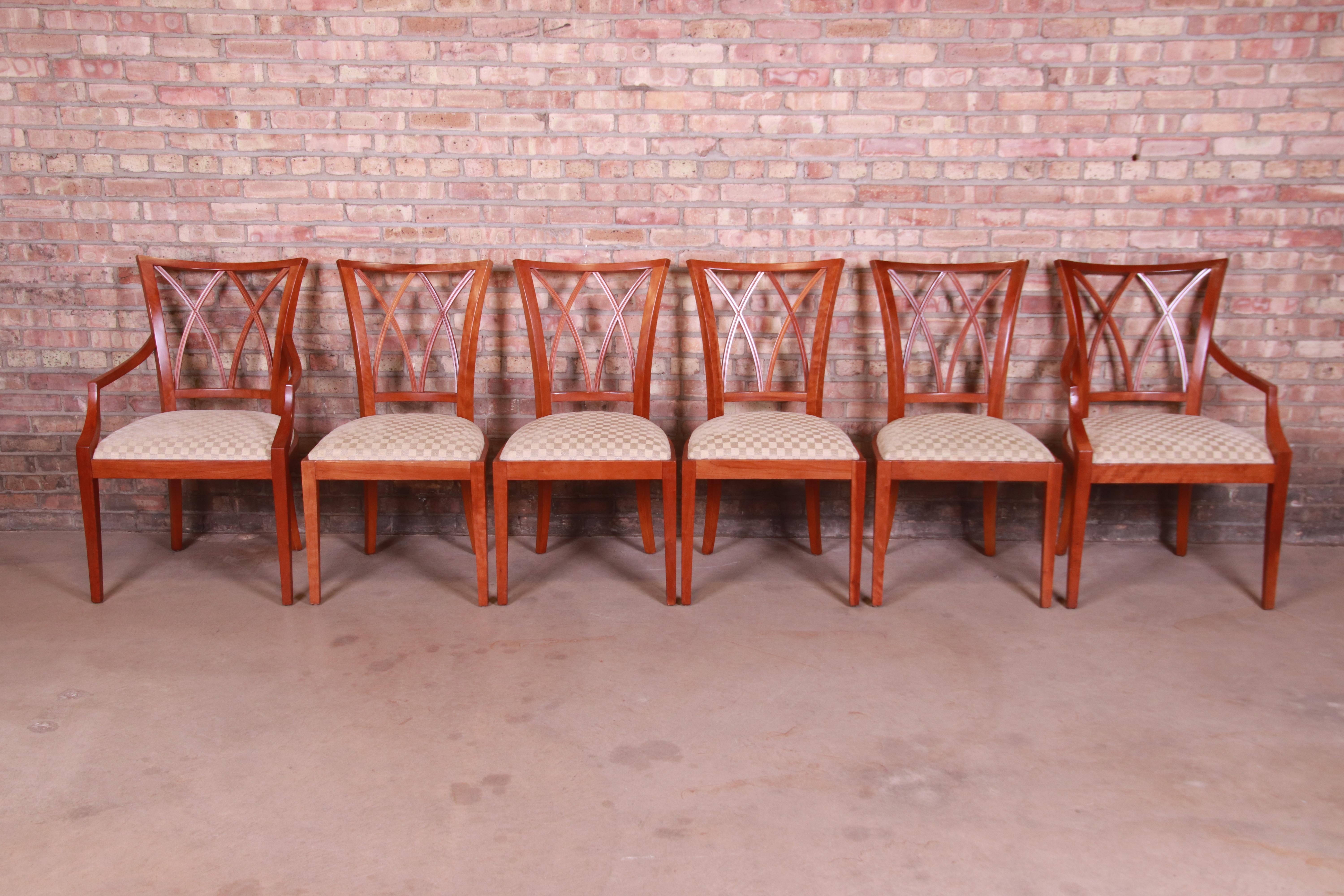 A gorgeous set of six contemporary neoclassical style dining chairs

By Baker Furniture

USA, circa 1990s

Solid carved cherrywood frames, with upholstered seats.

Measures:
Armchair- 23.25
