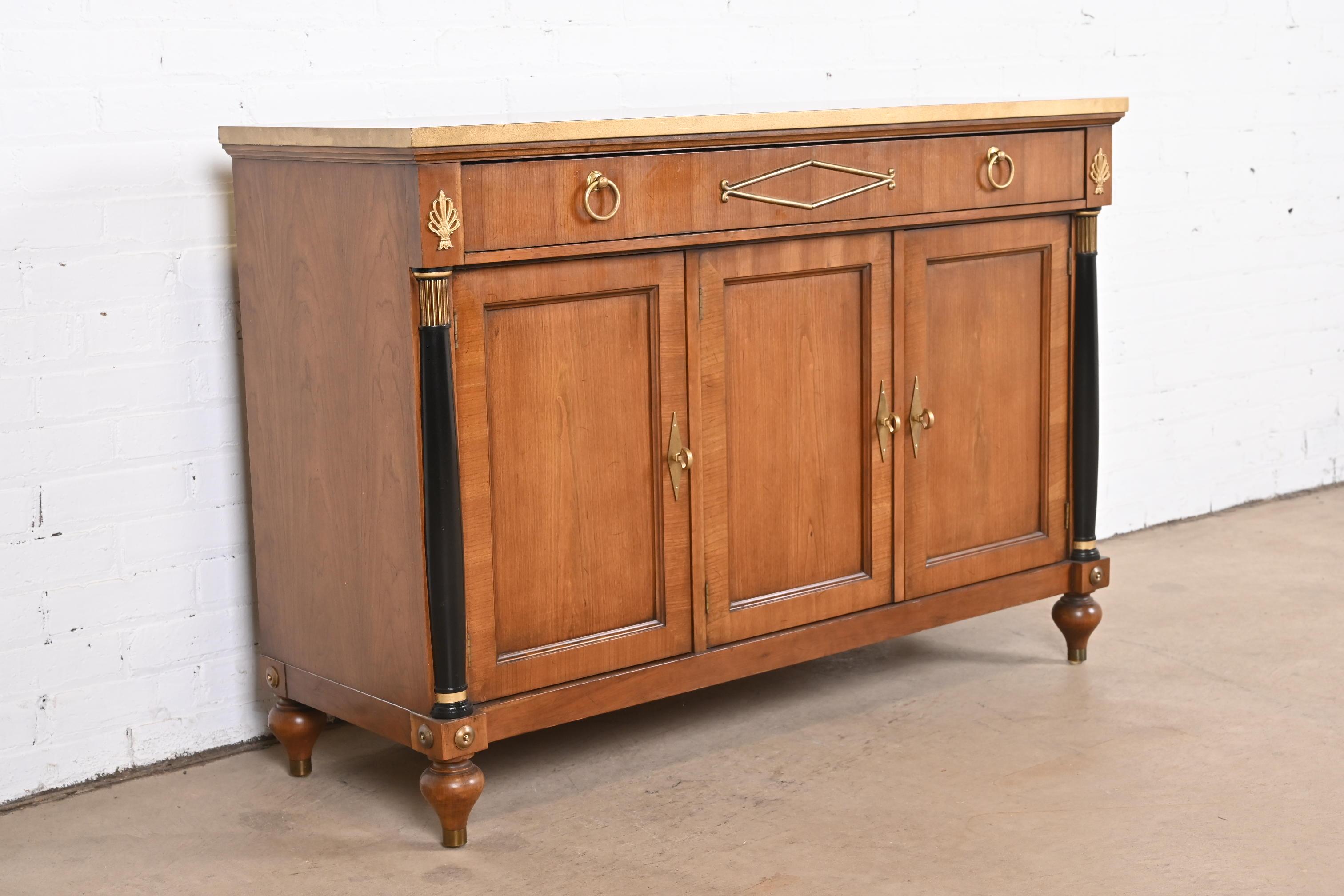 Mid-20th Century Baker Furniture Neoclassical Cherry, Gold Gilt, and Parcel Ebonized Sideboard