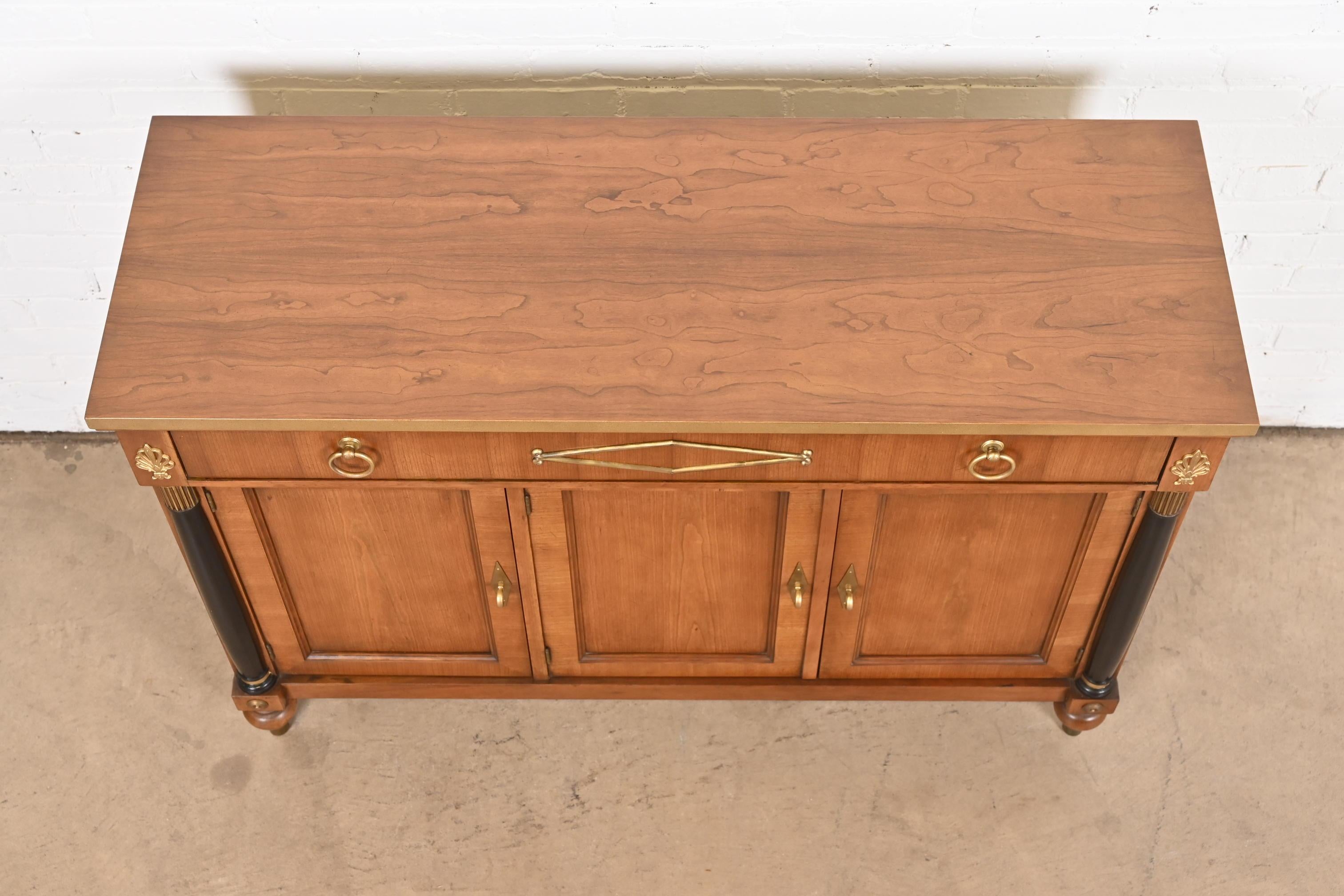 Baker Furniture Neoclassical Cherry, Gold Gilt, and Parcel Ebonized Sideboard 1