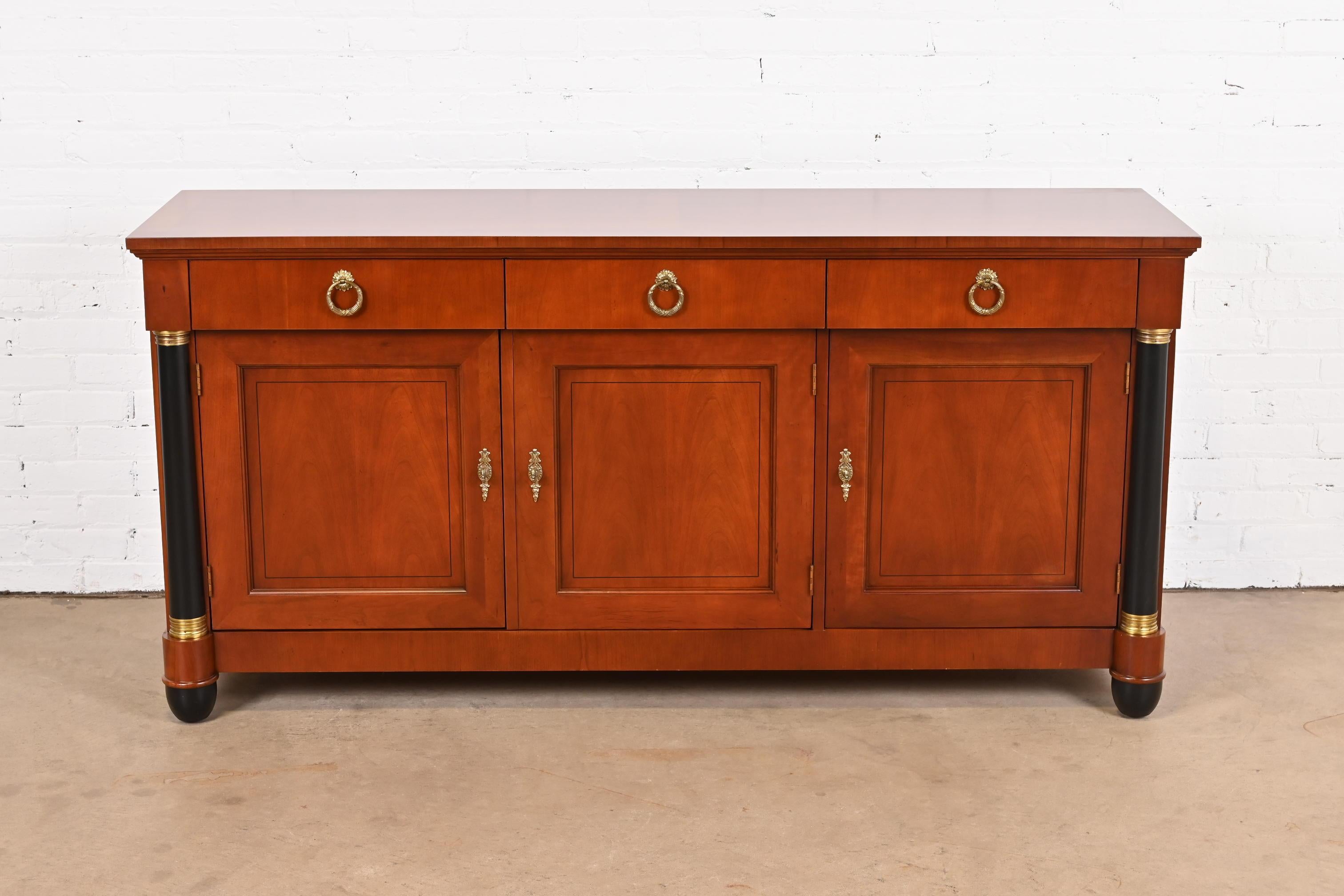 A gorgeous Neoclassical or Empire style sideboard, credenza, or bar cabinet

By Baker Furniture, 