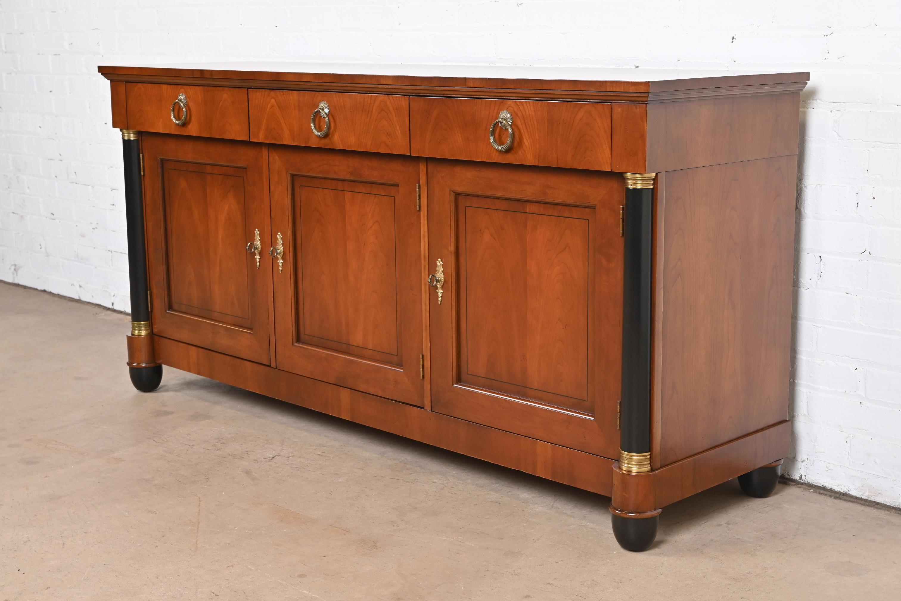 A gorgeous neoclassical or Empire style sideboard, credenza, or bar cabinet

By Baker Furniture, 