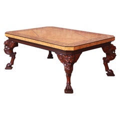 Baker Furniture Neoclassical Cocktail Table with Carved Lion Heads and Burl Top