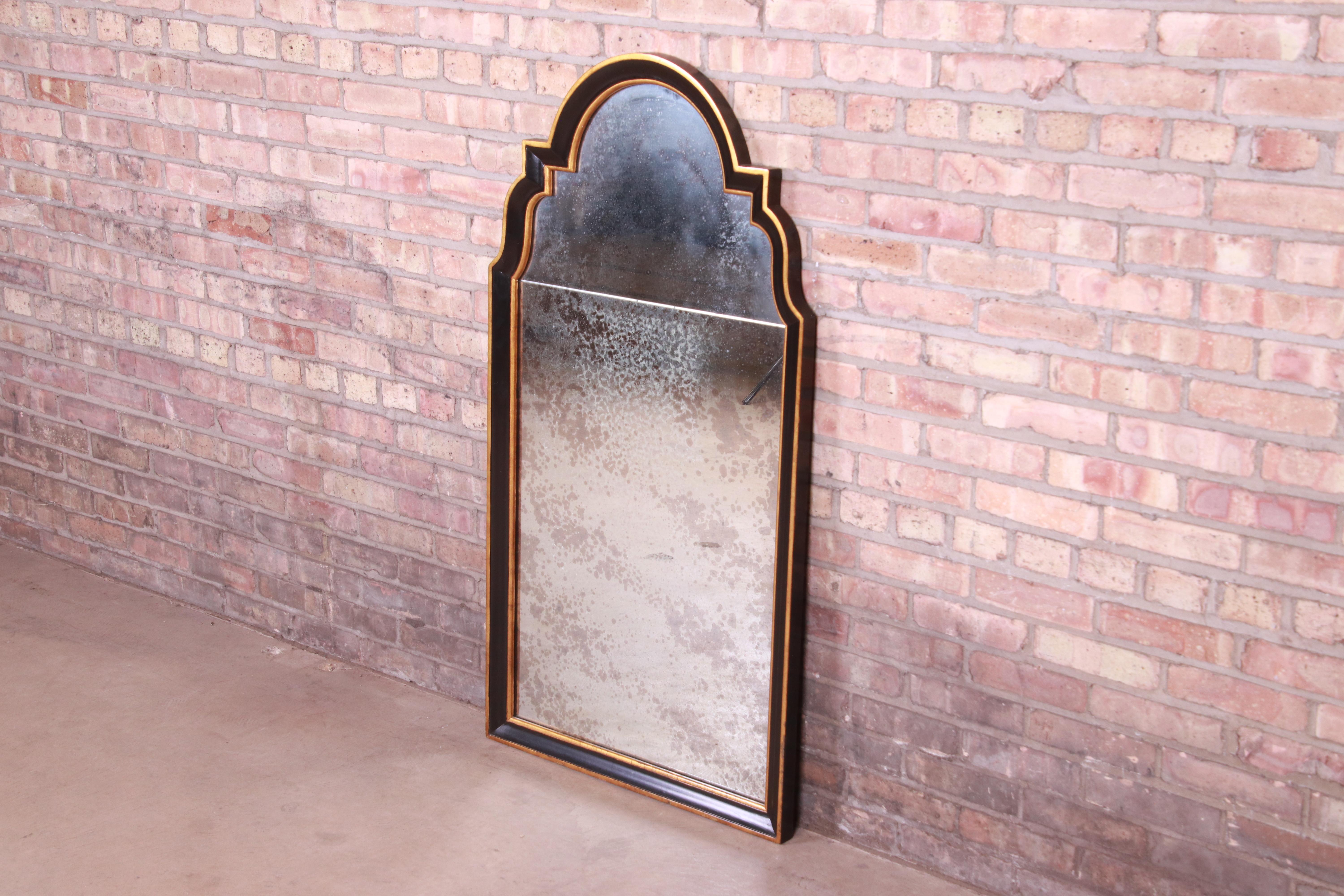 American Baker Furniture Neoclassical Ebonized and Parcel Gilt Framed Mirror