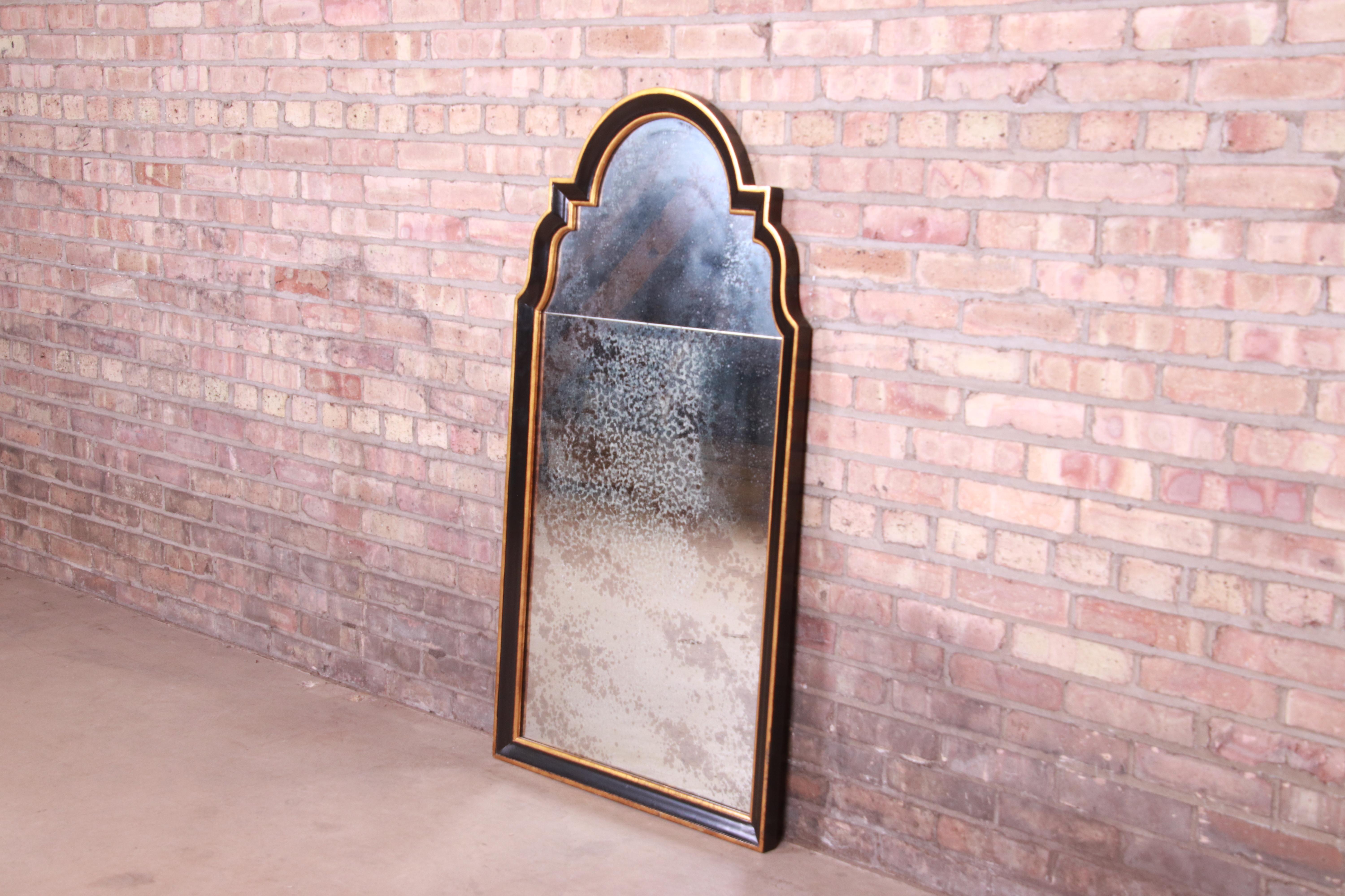 Baker Furniture Neoclassical Ebonized and Parcel Gilt Framed Mirror In Good Condition In South Bend, IN