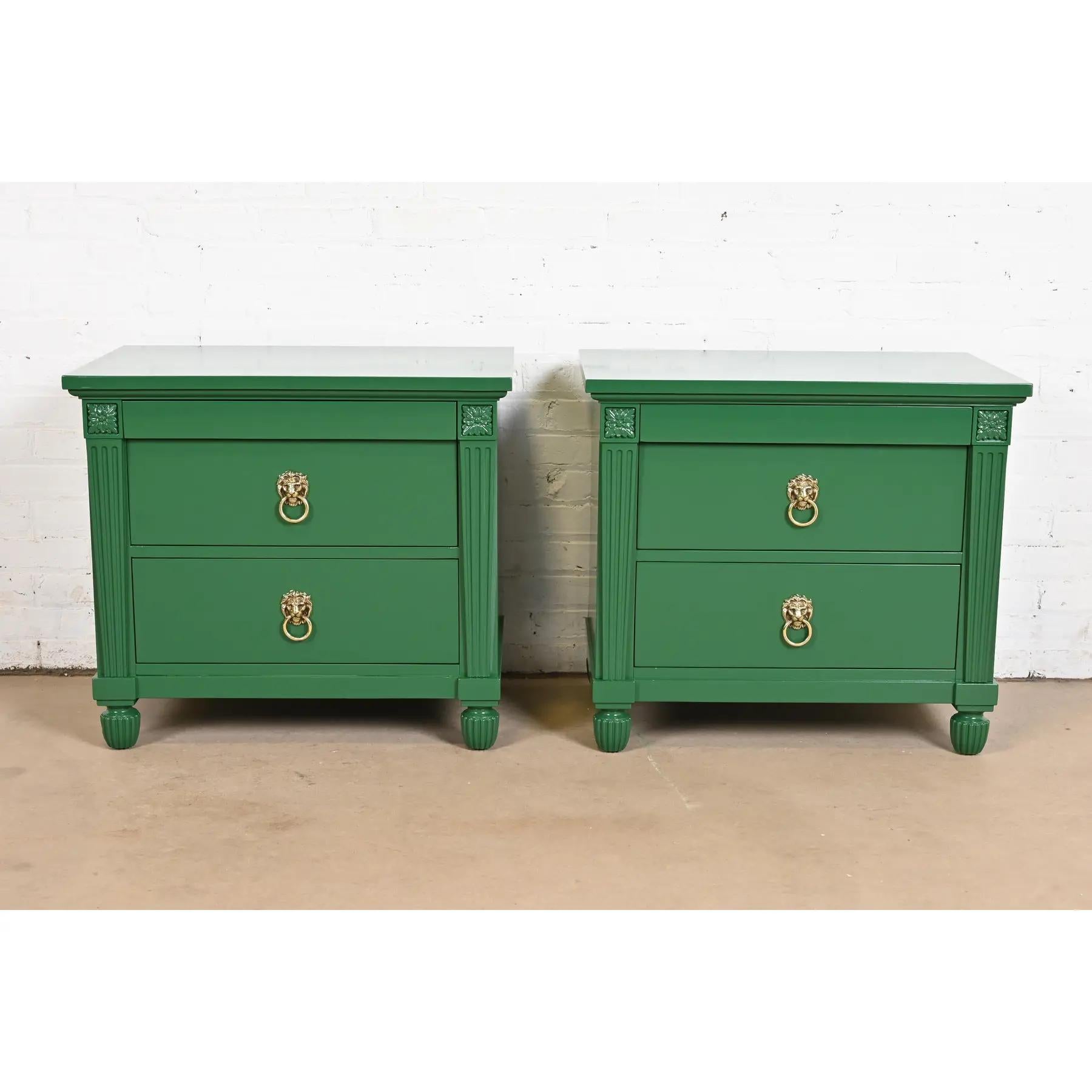 A gorgeous pair of Neoclassical or French Empire style bedside chests or end tables

By Baker Furniture

USA, Circa 1980s

Green lacquered carved mahogany, with original lion head brass hardware.

Each measures: 28