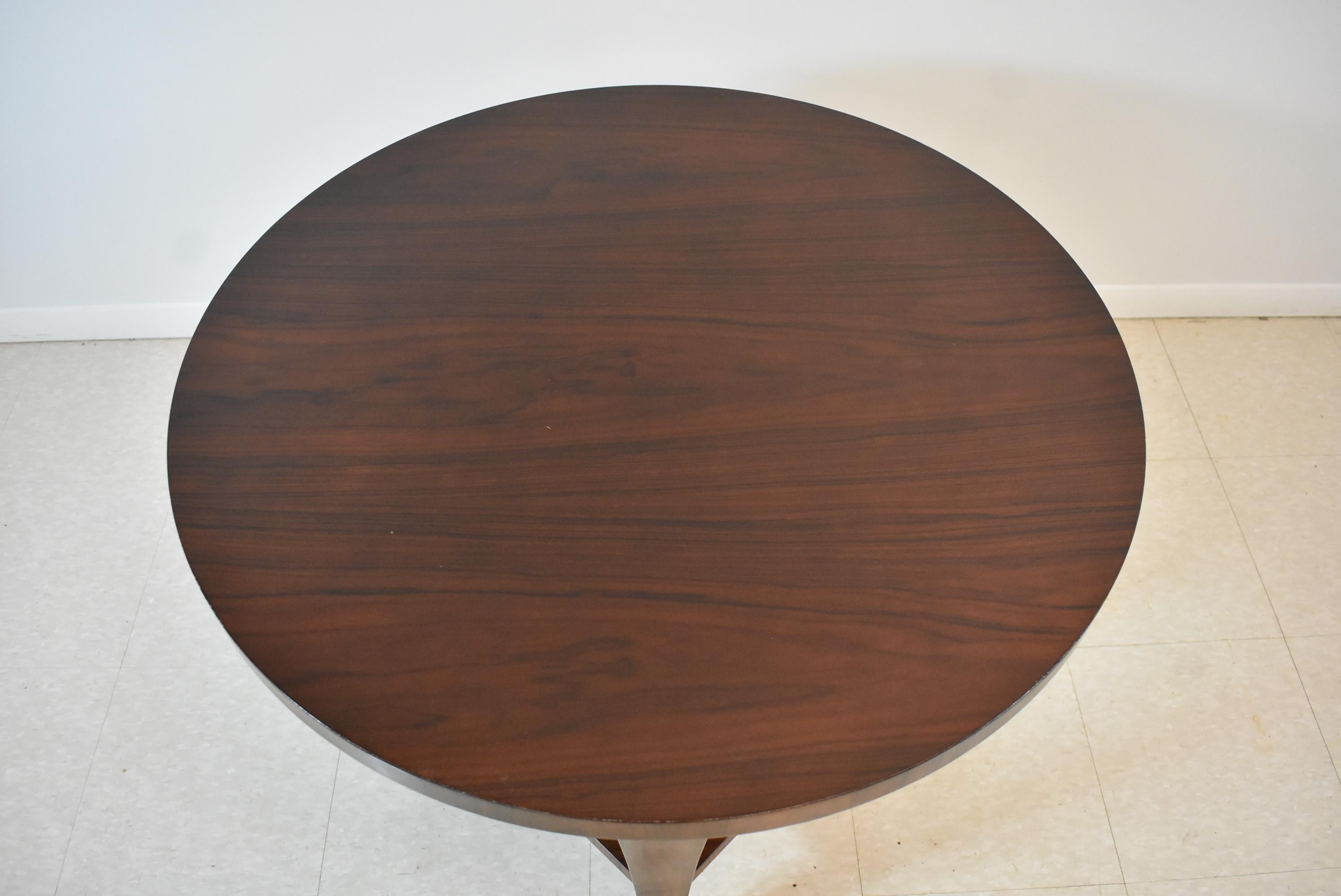 Rosewood occasional table by Baker Furniture for Barbara Barry. High style with chrome leg caps. Very good condition. Dimensions: 30
