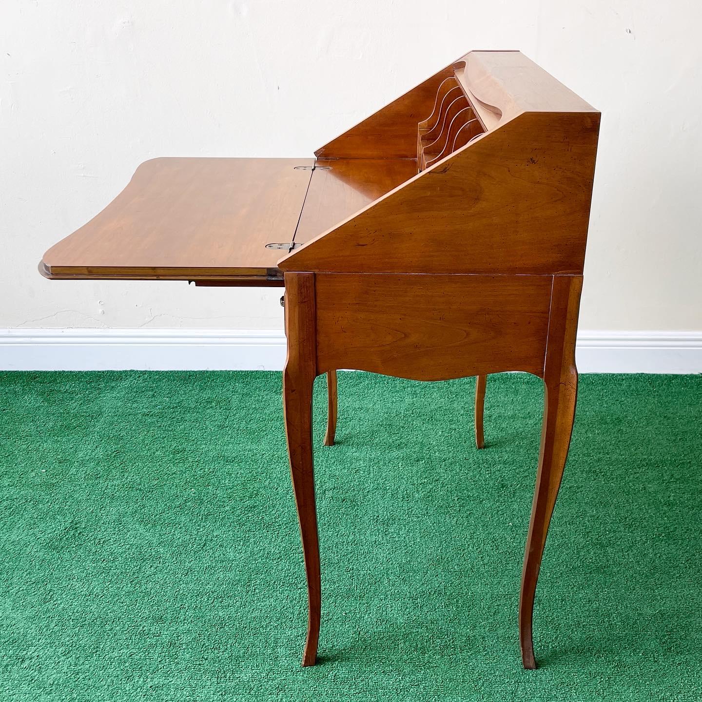 1980s Queen Anne slant front secretary desk.
This is a quality Baker Furniture piece, made with exceptional craftsmanship.
Keys are included but unsure if they are the original keys.

Measurements: 31”w, 17”d, 38”h
Desk adds 15” extension
Height to