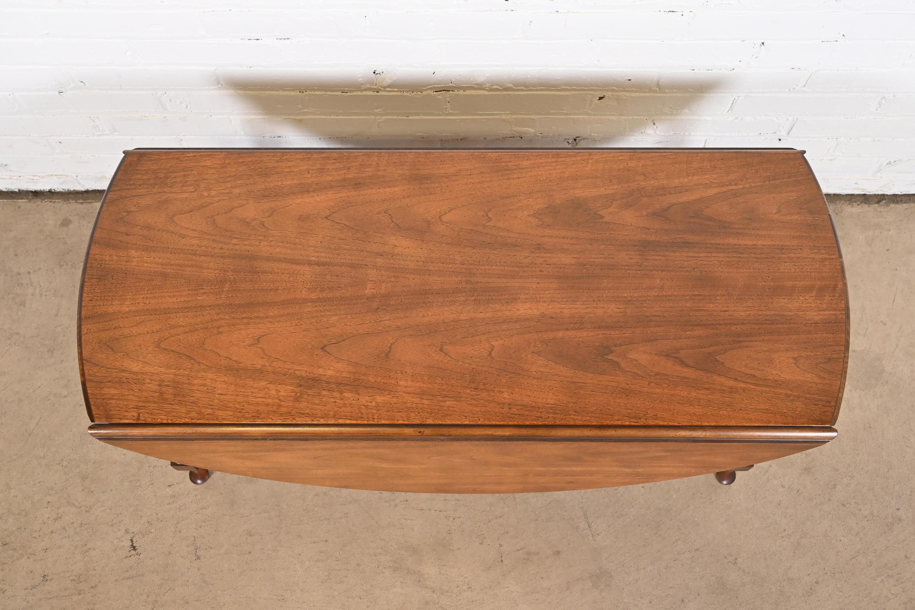 20th Century Baker Furniture Queen Anne Walnut Drop Leaf Coffee Table For Sale