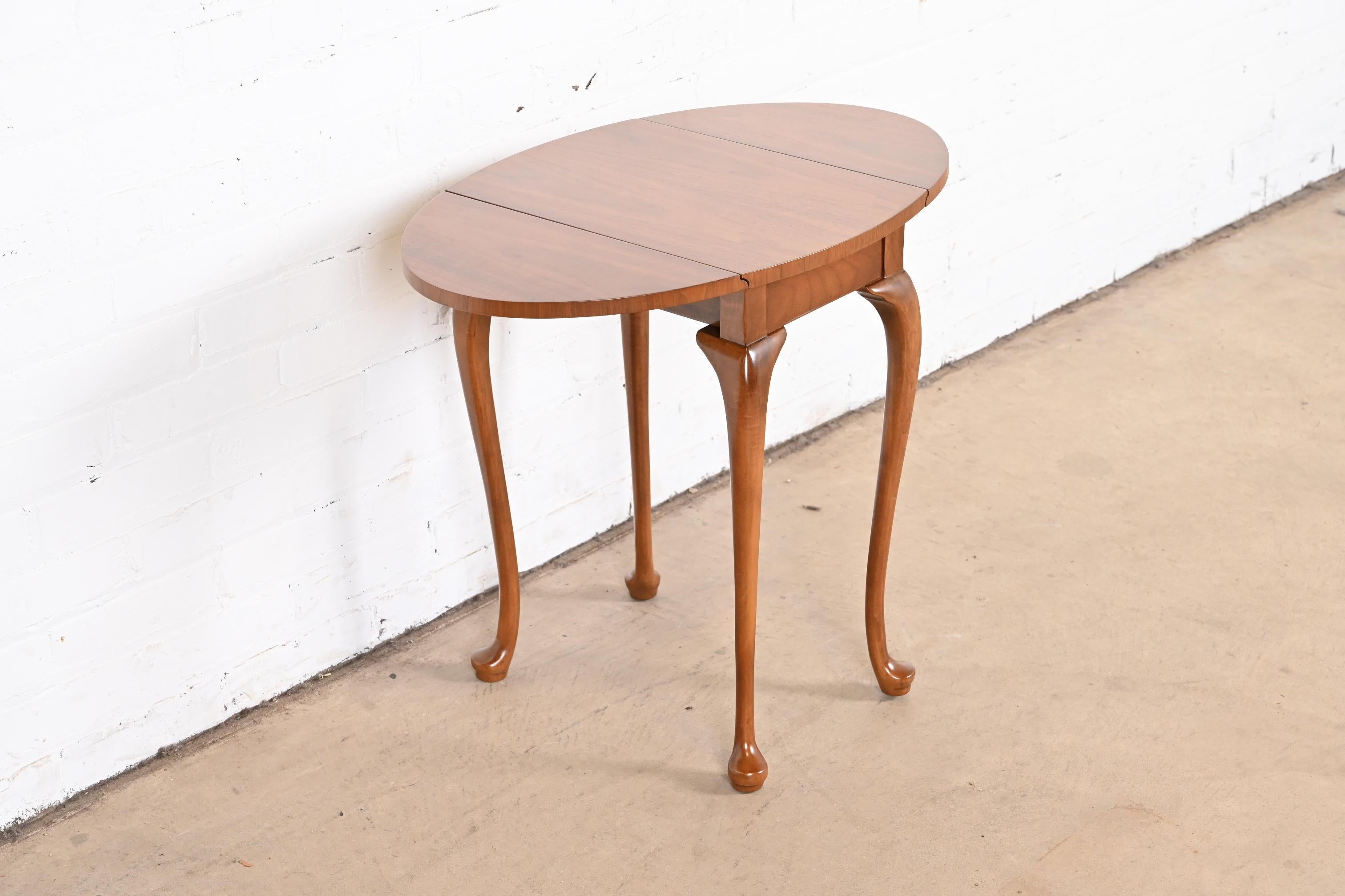 20th Century Baker Furniture Queen Anne Walnut Petite Drop Leaf Tea Table, Newly Refinished For Sale