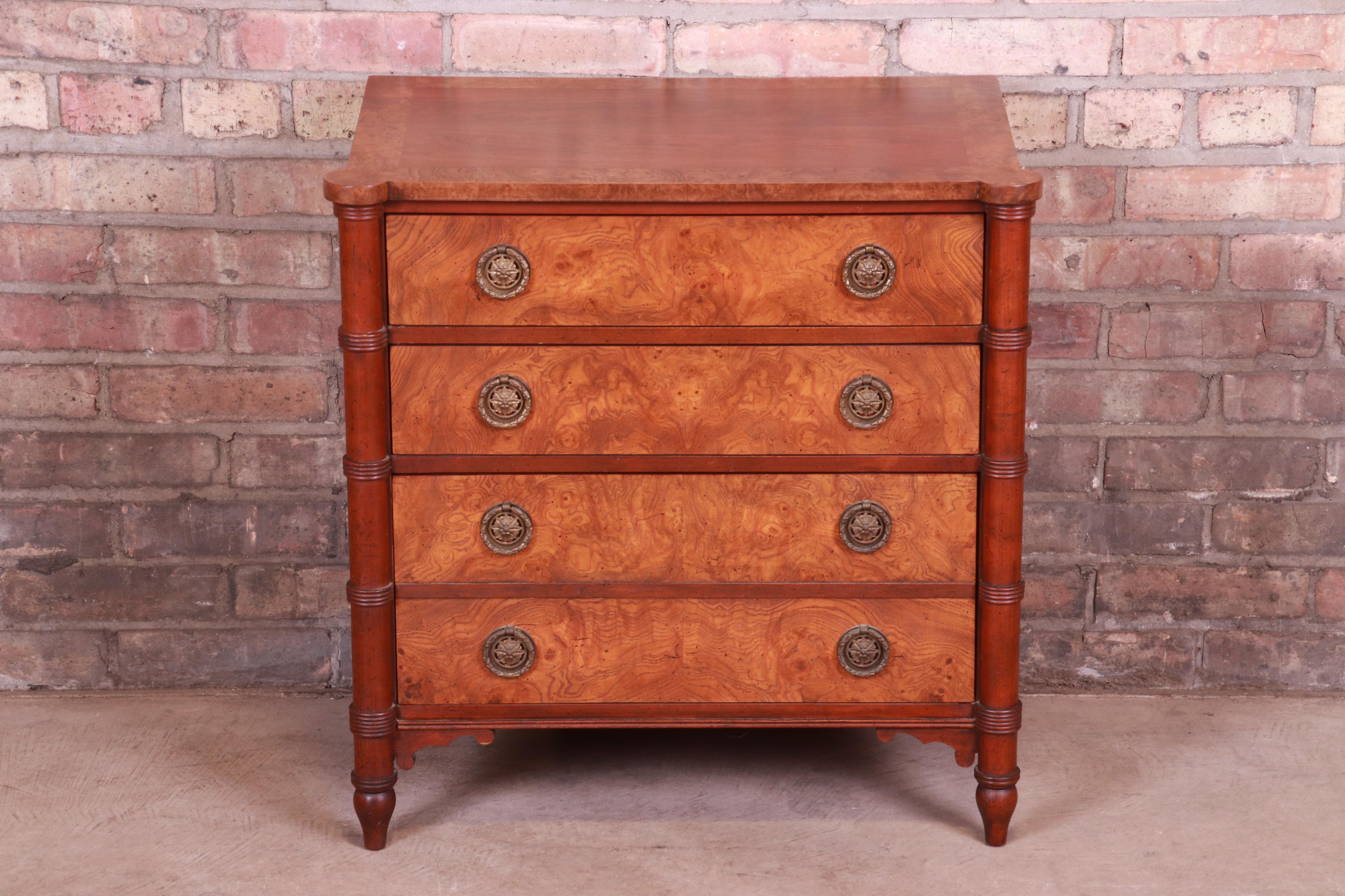 An exceptional Regency style bachelor chest or nightstand

By Baker Furniture

USA, 20th century

Book-matched walnut, with burled walnut banding and drawer fronts and original brass hardware.

Measures: 24.5