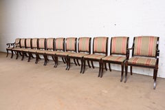 Baker Furniture Regency Mahogany and Ebonized Dining Chairs, Set of Twelve