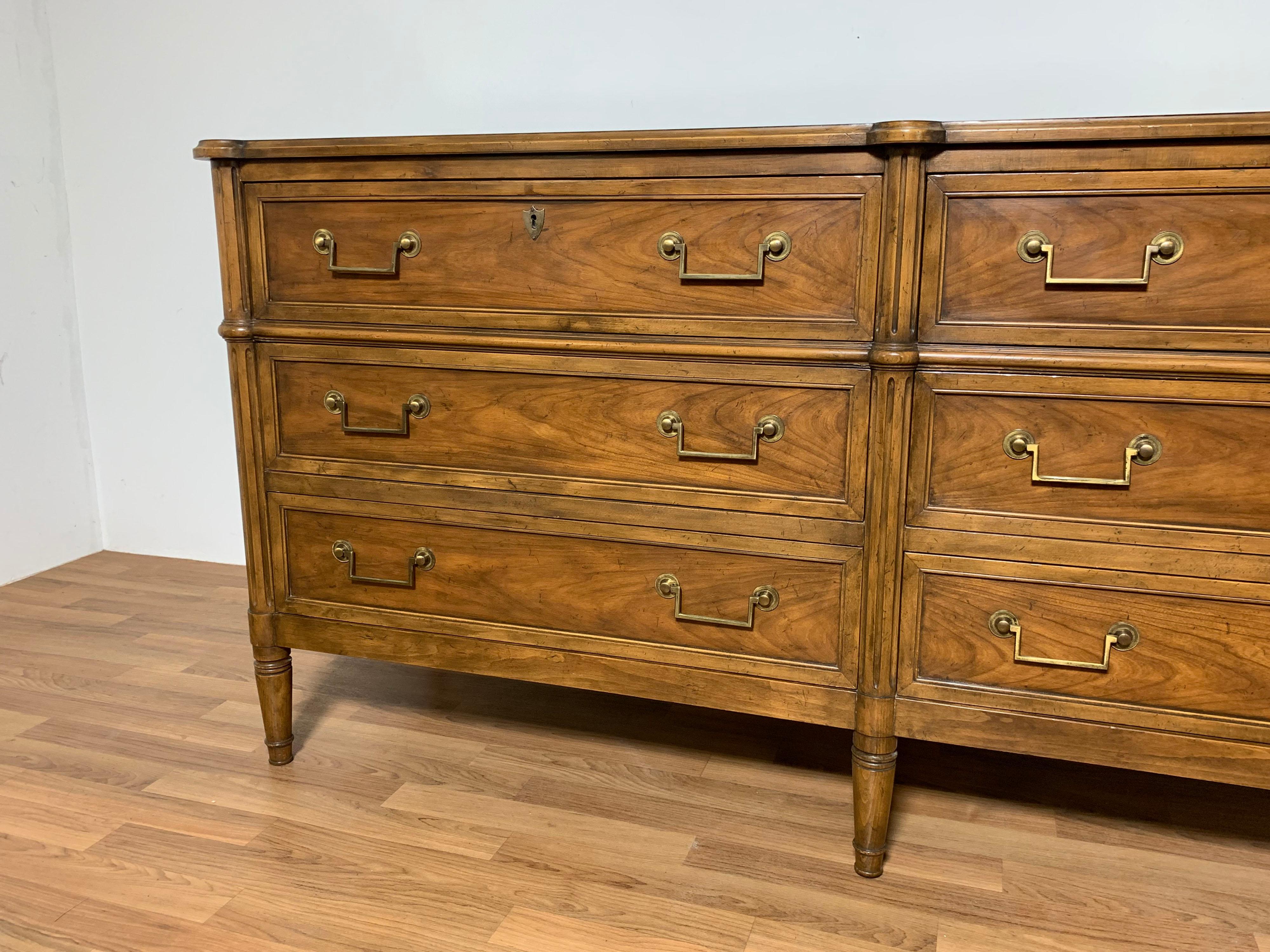 A finely crafted six drawer mahogany dresser in the English Regency style by Baker Furniture, ca. 1950s.
 
