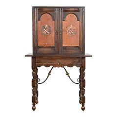 Baker Furniture Spanish Colonial Carved Oak Leather Front Bookcase, Circa 1900