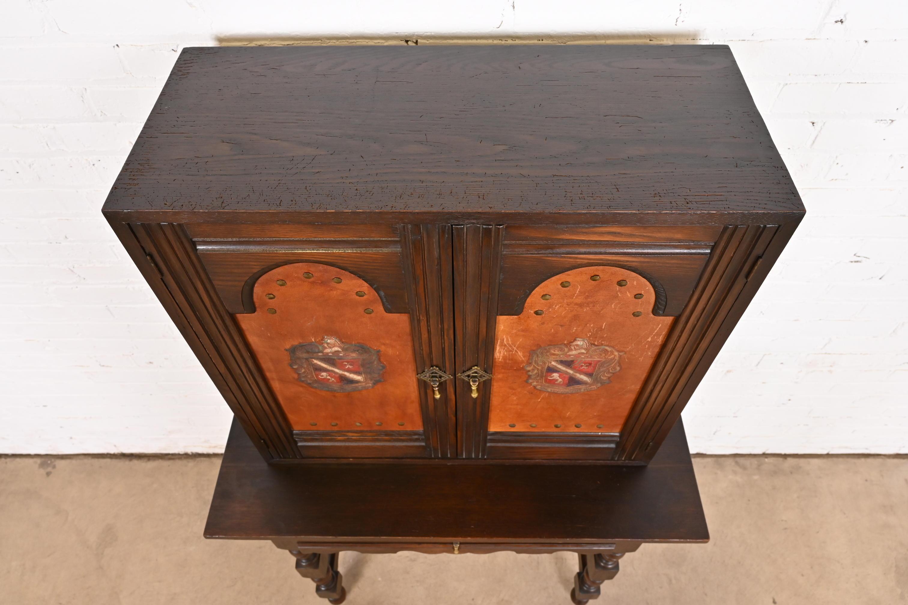 Baker Furniture Spanish Colonial Carved Oak Leather Front Bookcase or Cabinet For Sale 4