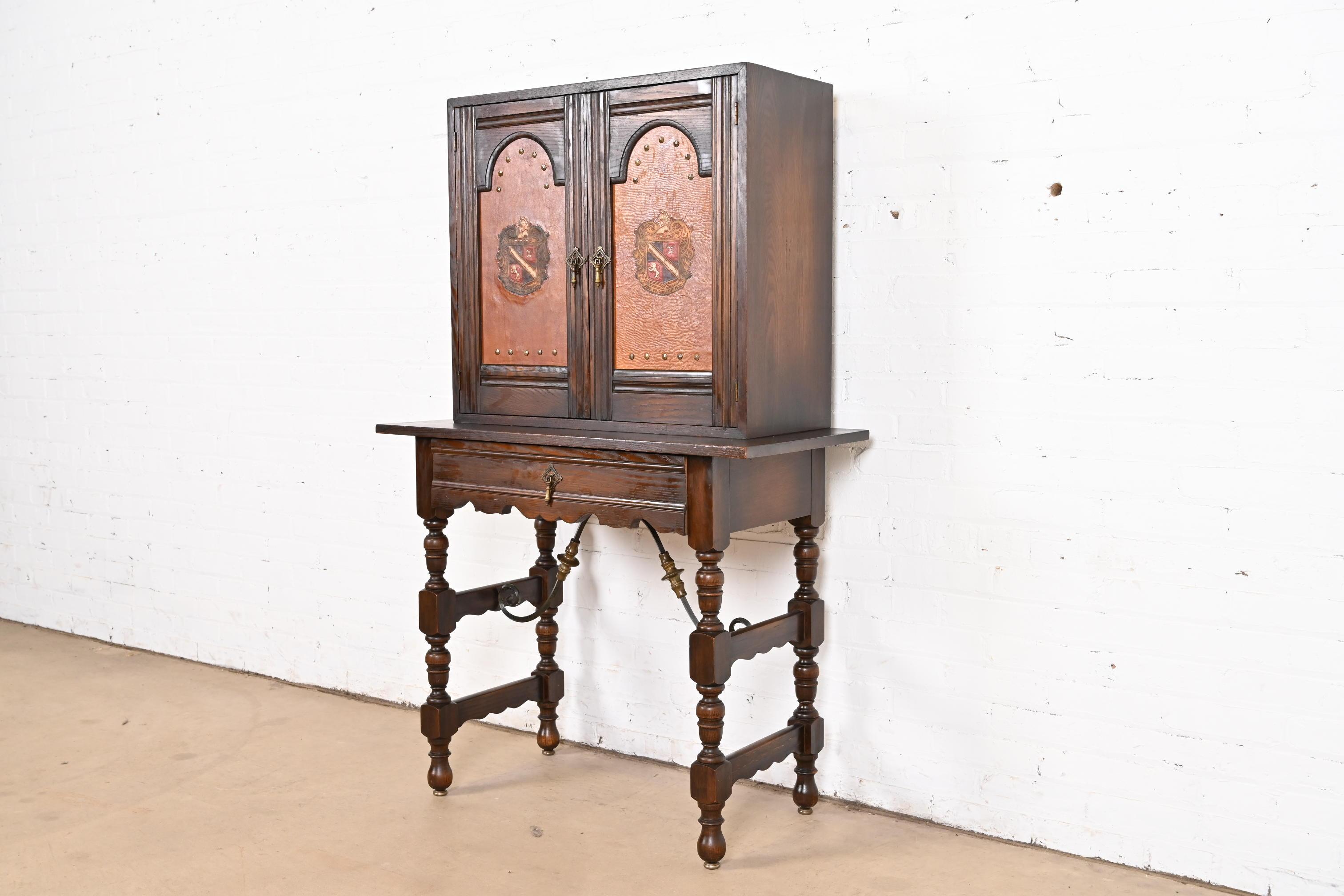 Baker Furniture Spanish Colonial Carved Oak Leather Front Bookcase or Cabinet In Good Condition For Sale In South Bend, IN