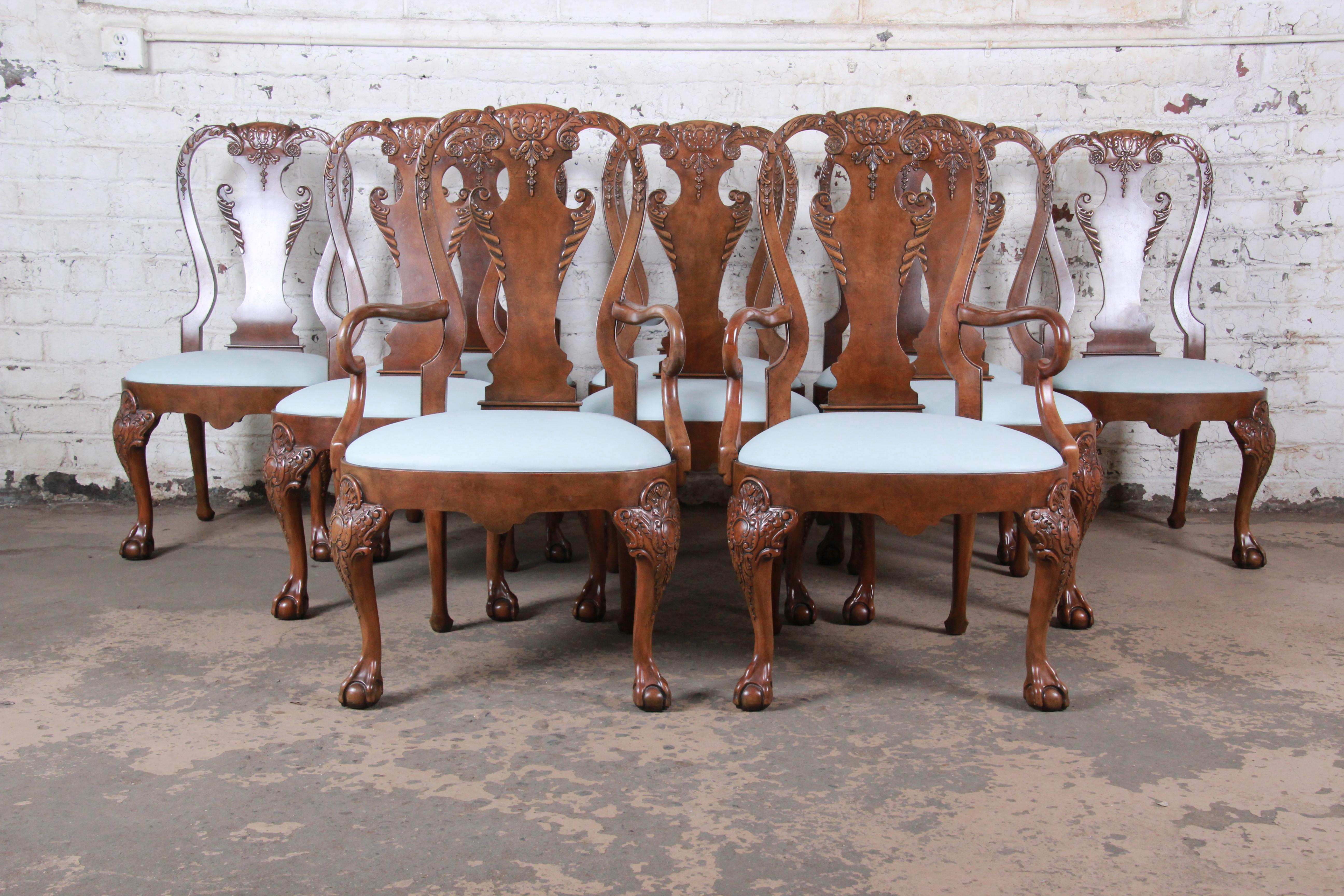An exceptional set of ten Chippendale style ornate carved walnut dining chairs

By Baker Furniture 