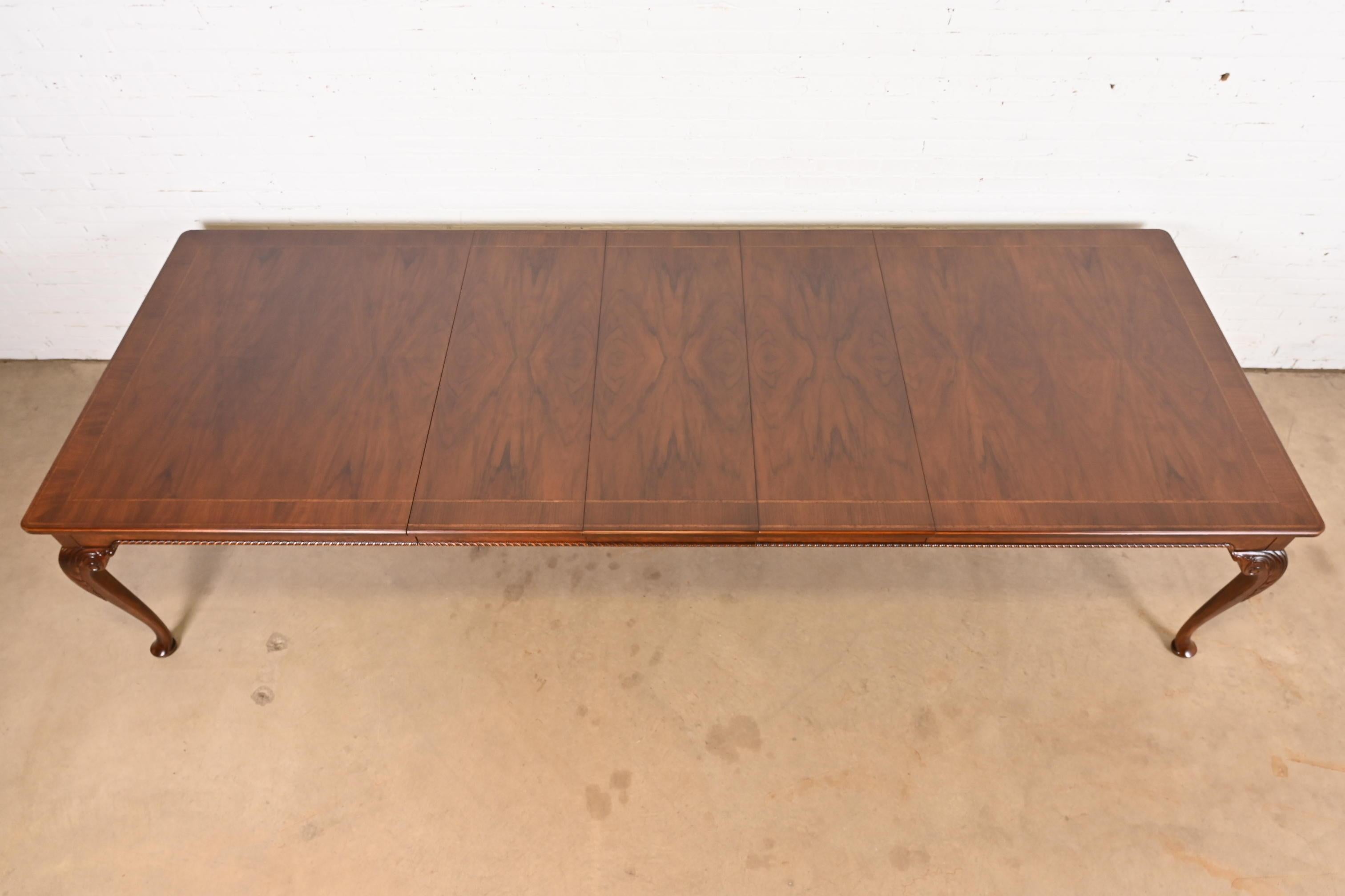 Mid-20th Century Baker Furniture Stately Homes Chippendale Burled Walnut Extension Dining Table For Sale