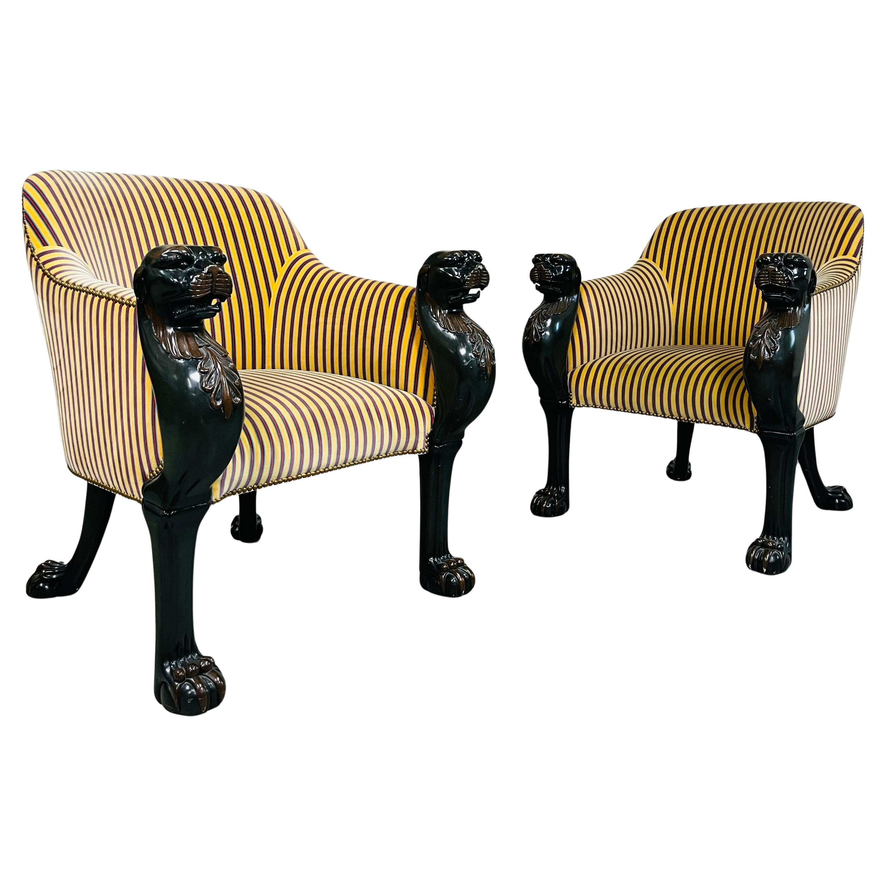 A pair of Baker - Model: BA5050 - Regency Tub Chairs - Superb tub chairs in the Egyptian style. Elaborately hand-carved leopard masks continuing into deep green mahogany over lifelike clawed and padded feet at both the front and back legs. Giltwood