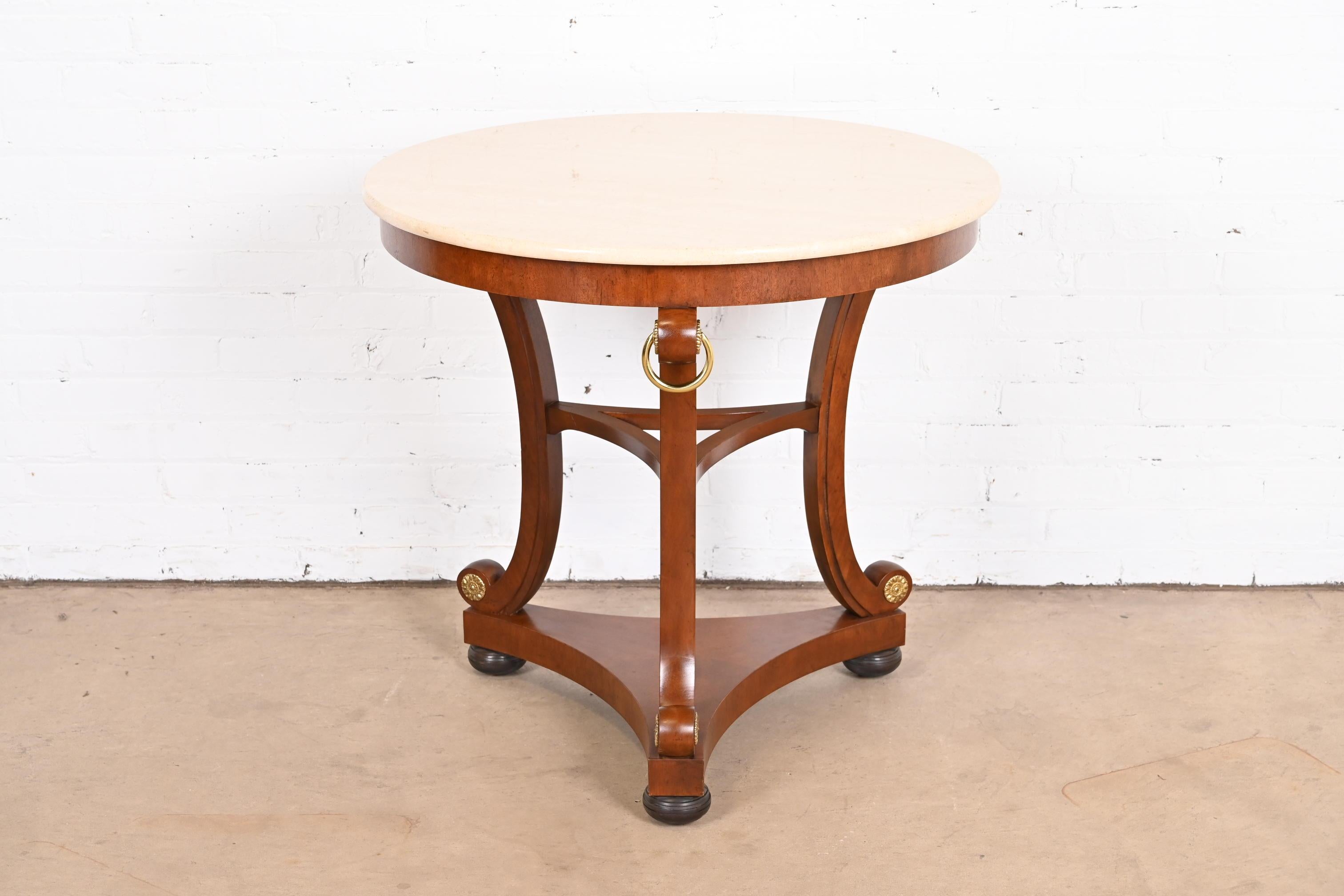 An exceptional Regency or Empire style tea table or center table

By Baker Furniture, 