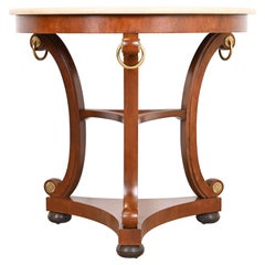 Table centrale en acajou sculpté et plateau en marbre Baker Furniture Stately Homes Regency
